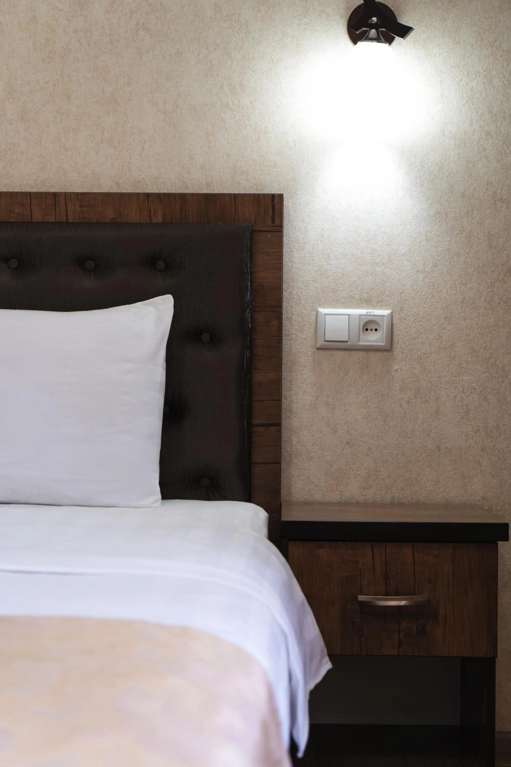 Bed in TOURIST INN hotel