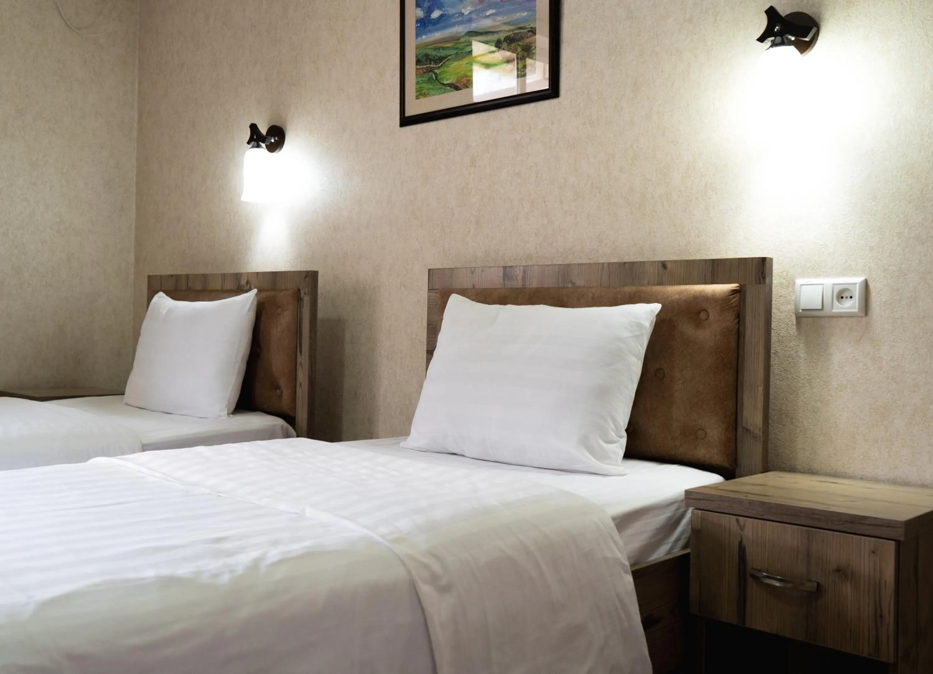 Bed in TOURIST INN hotel