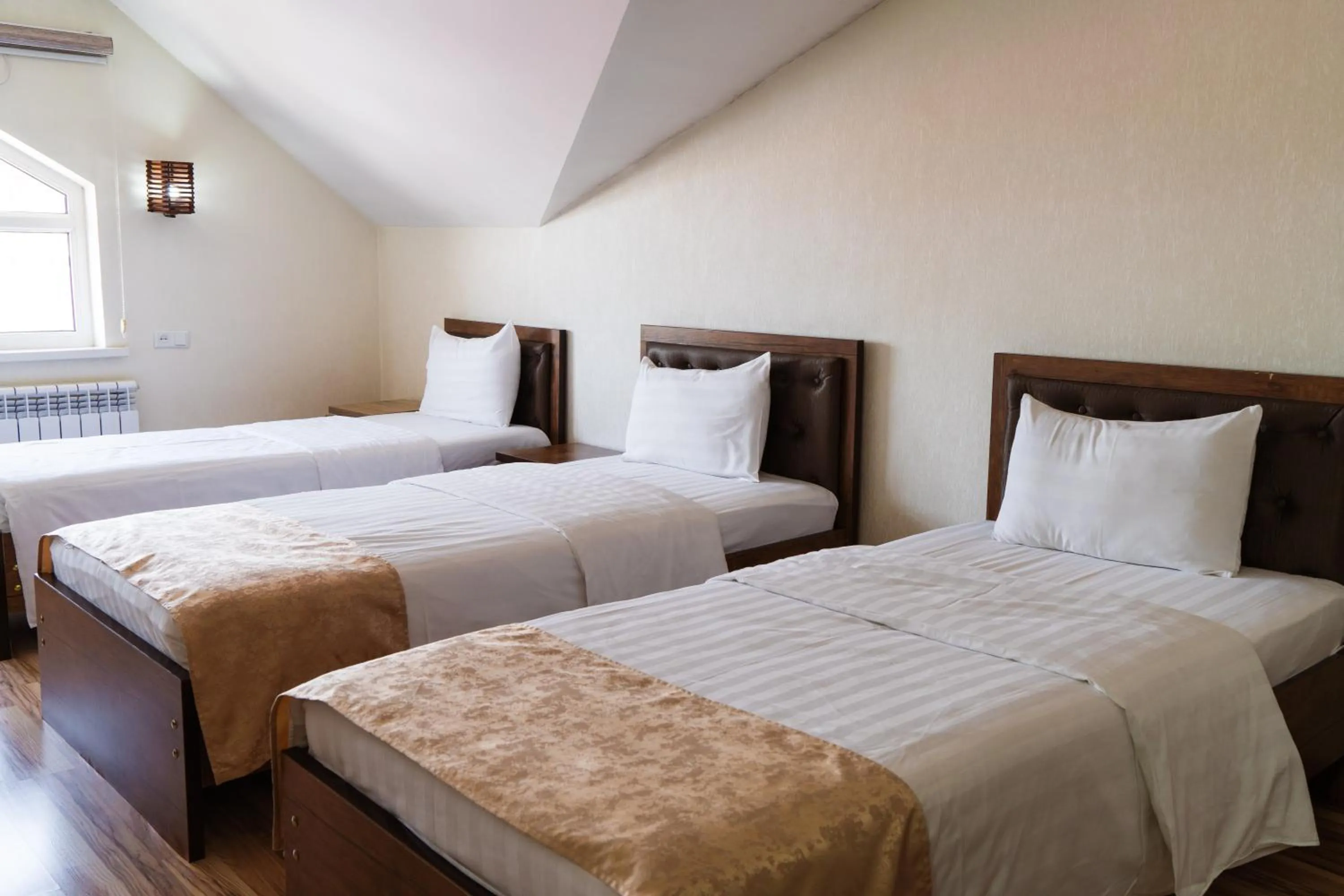 Bed in TOURIST INN hotel