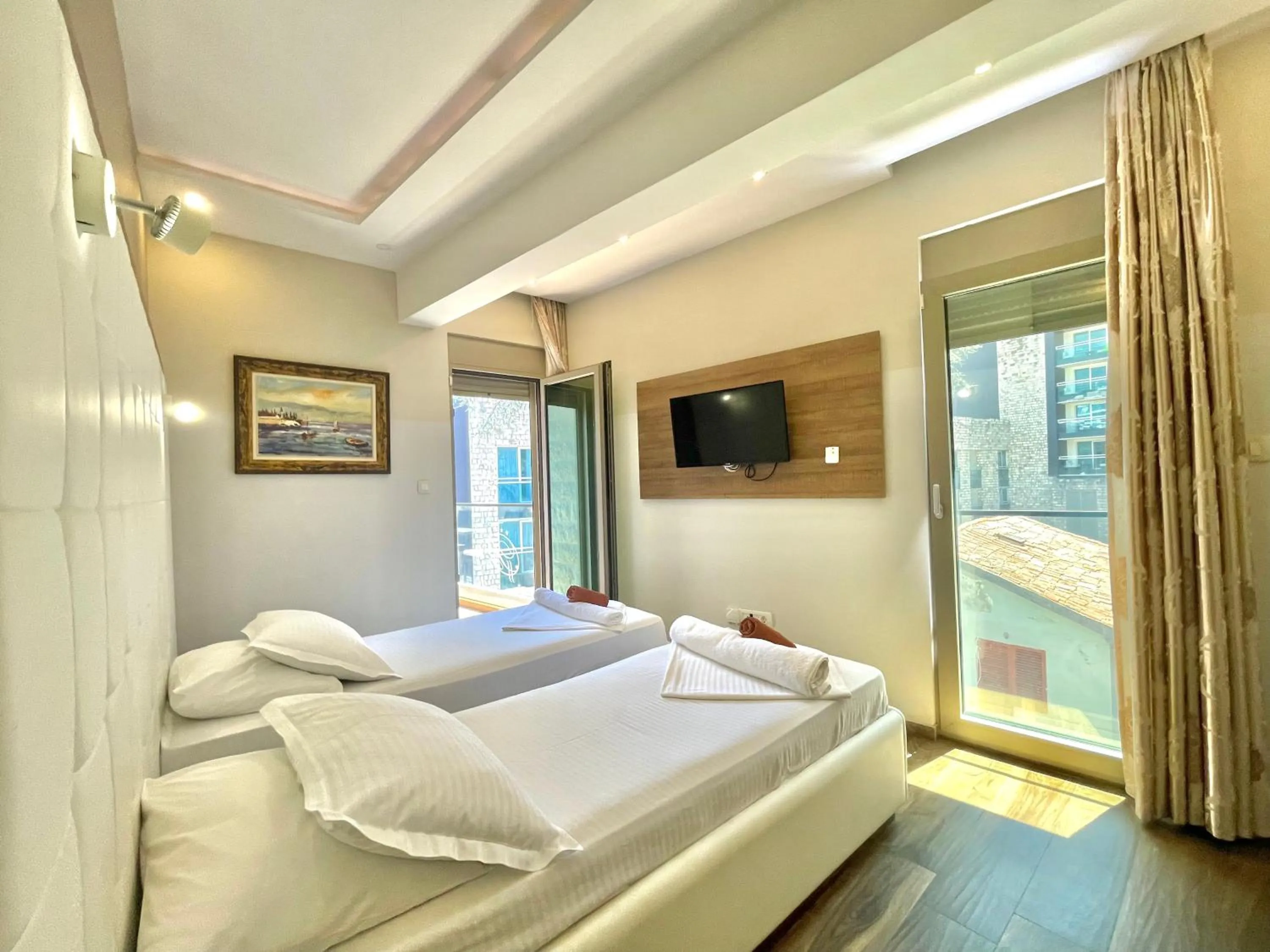 Bed in Hotel Butua Residence