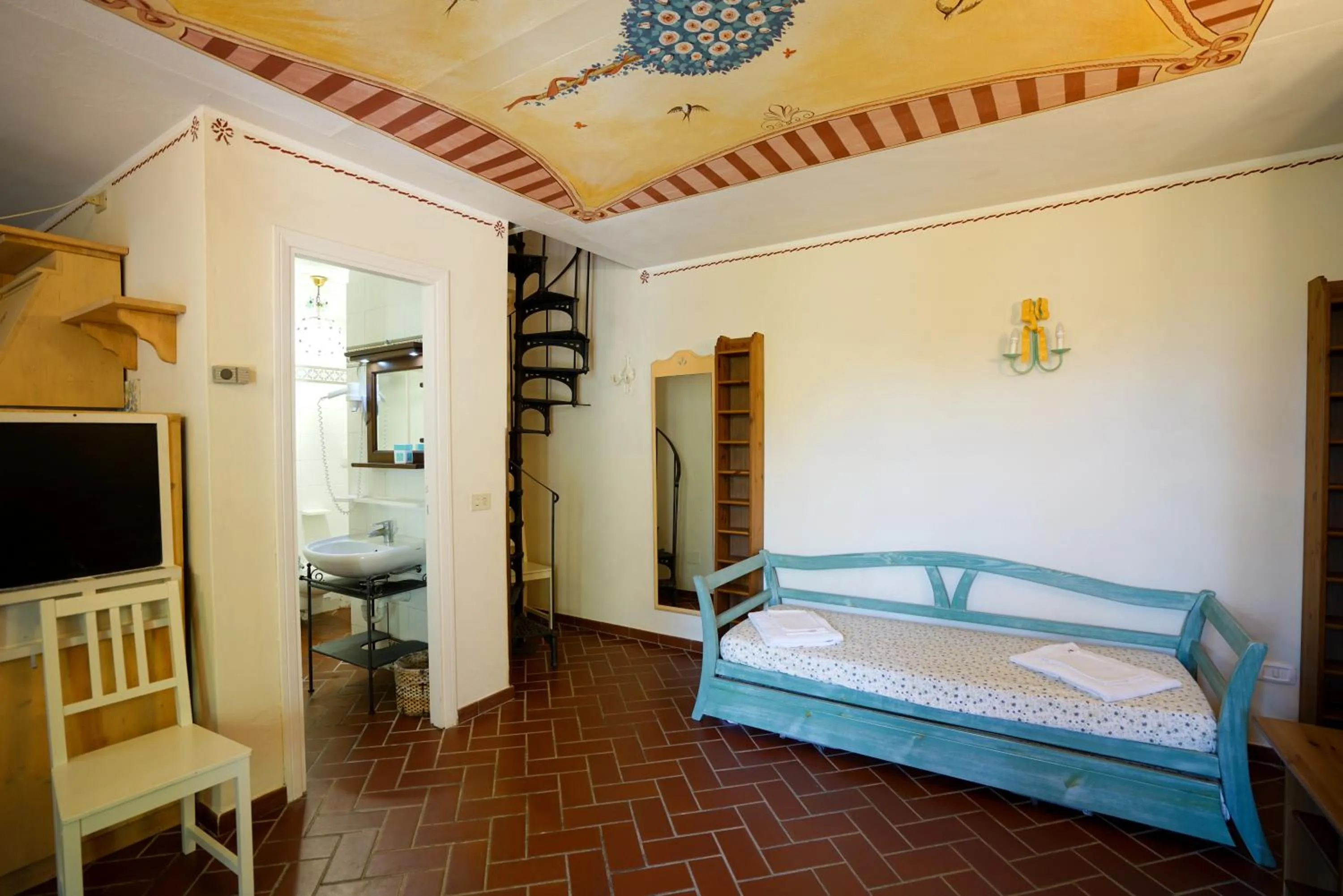 Living room, Bed in Residence Le Acacie