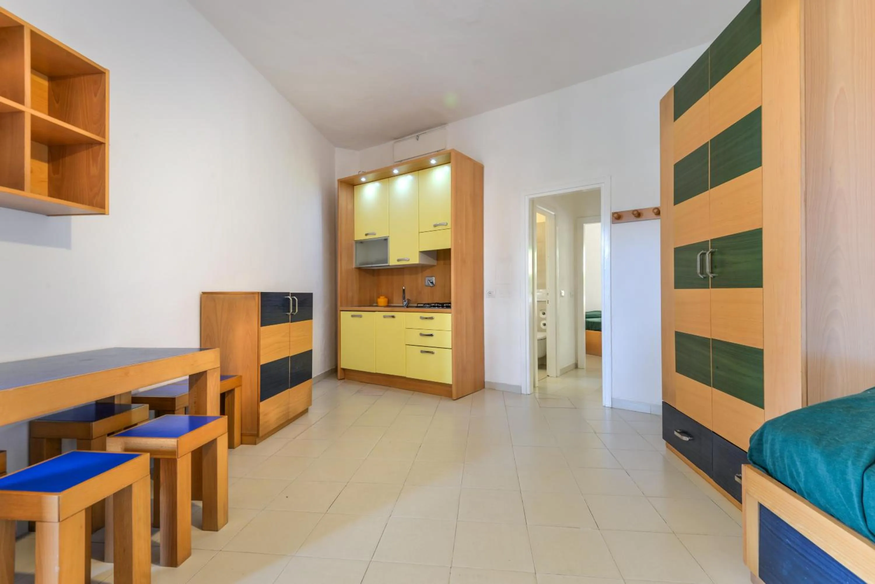 Living room, Bed in Residence Le Acacie