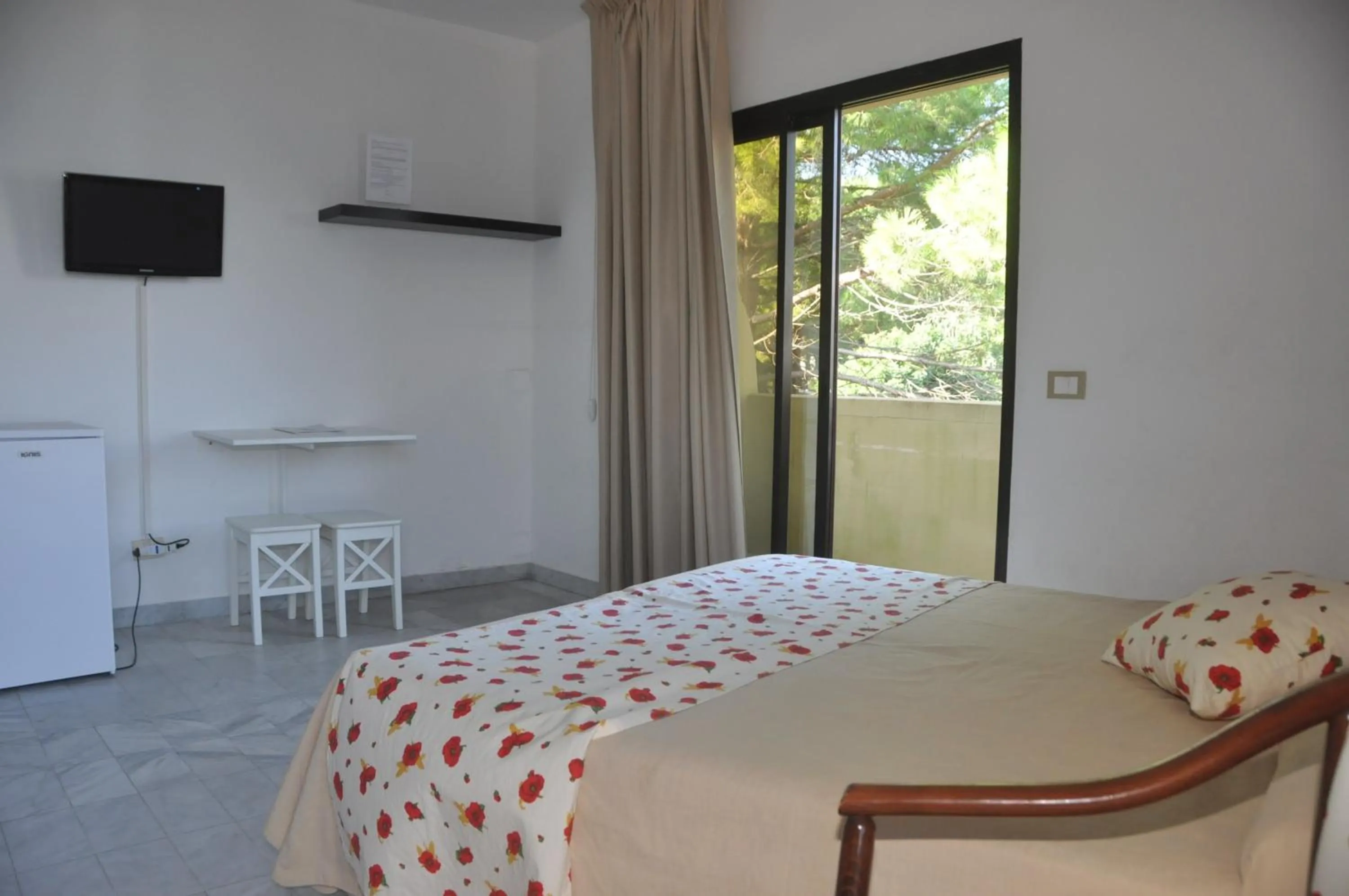 Photo of the whole room, Bed in Residence Le Acacie