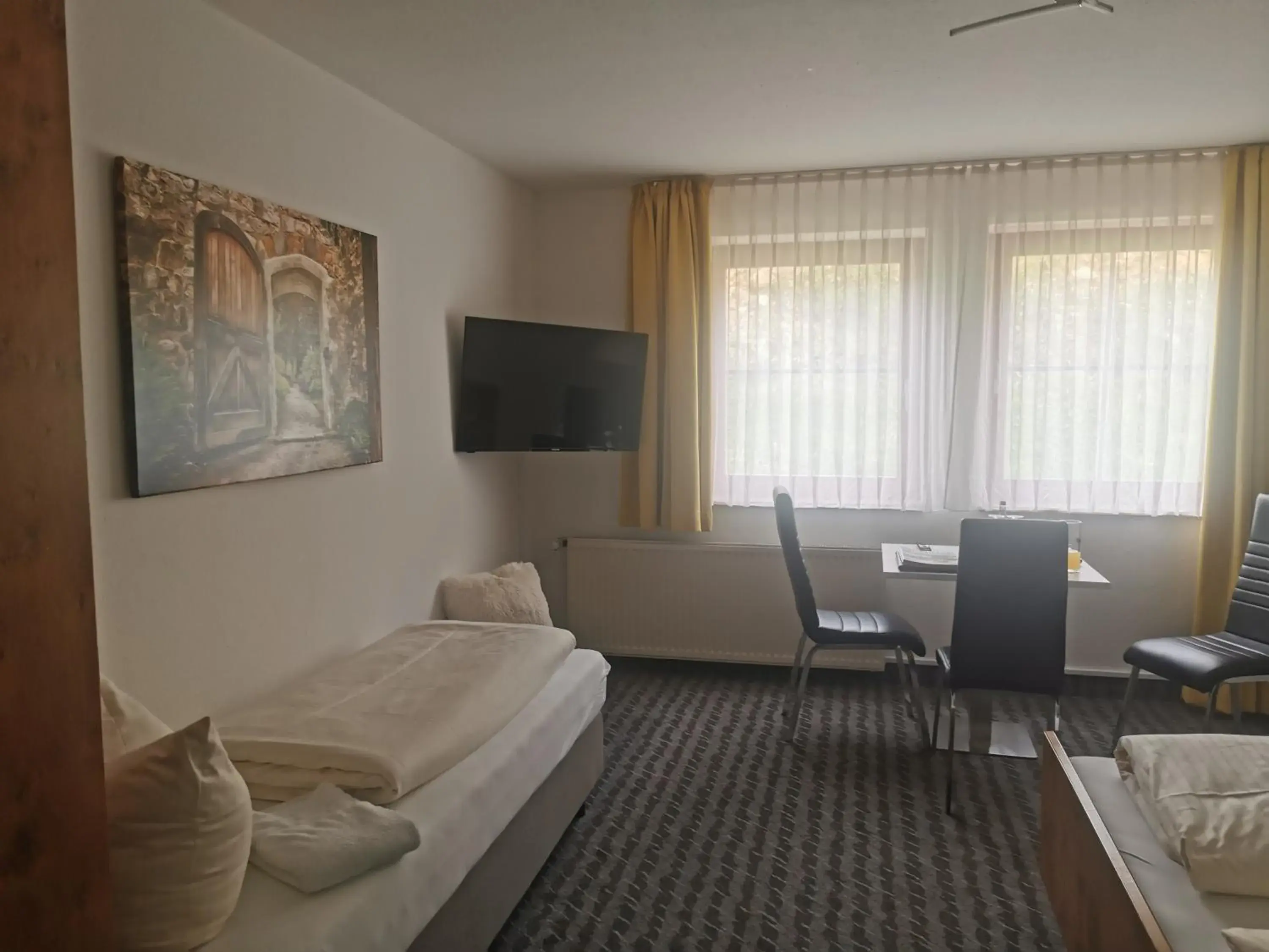 Triple Room with City View in Hotel Sonne Triple Room with City View in Hotel Sonne