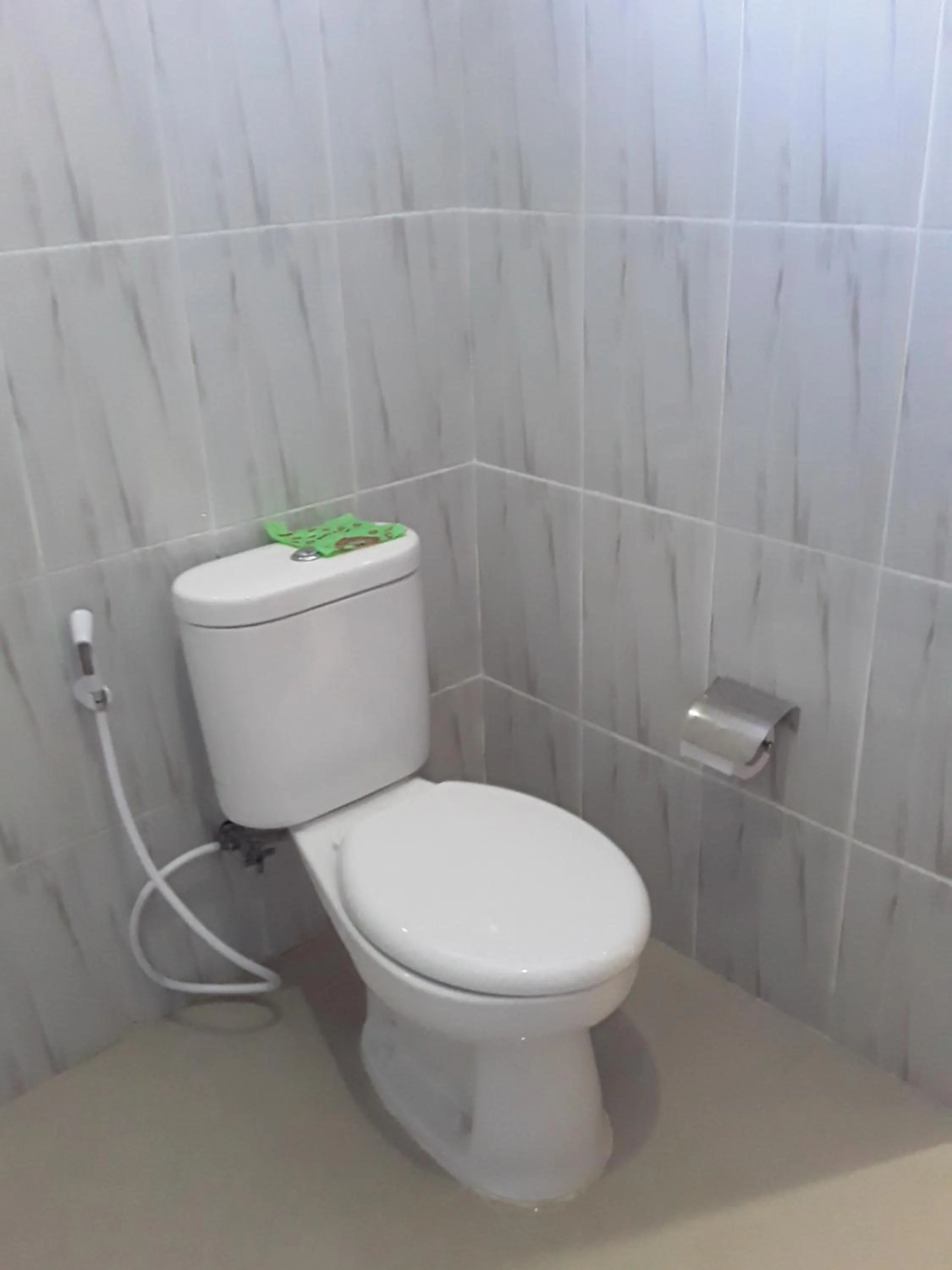 Toilet in Victory Hotel