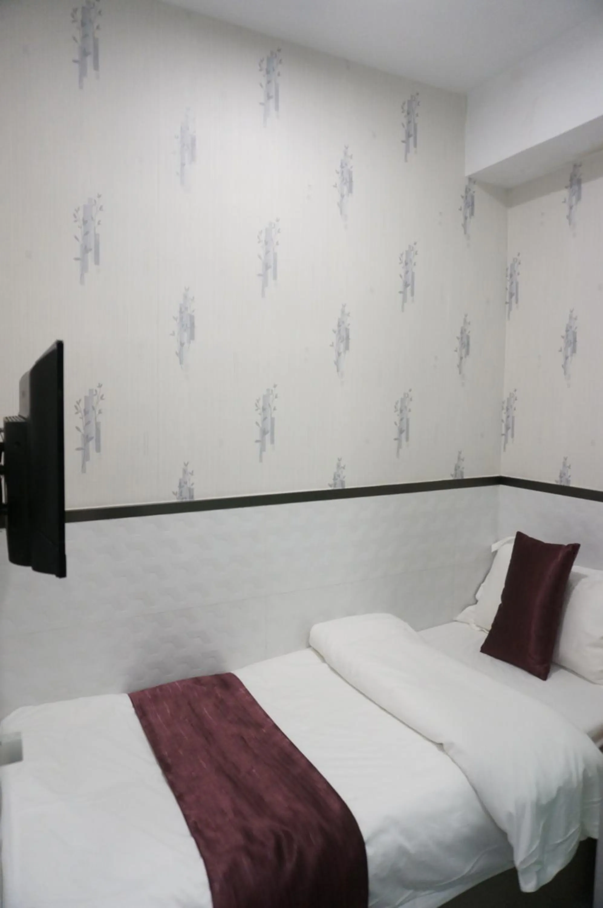 Bed in Vve Vve Hotel