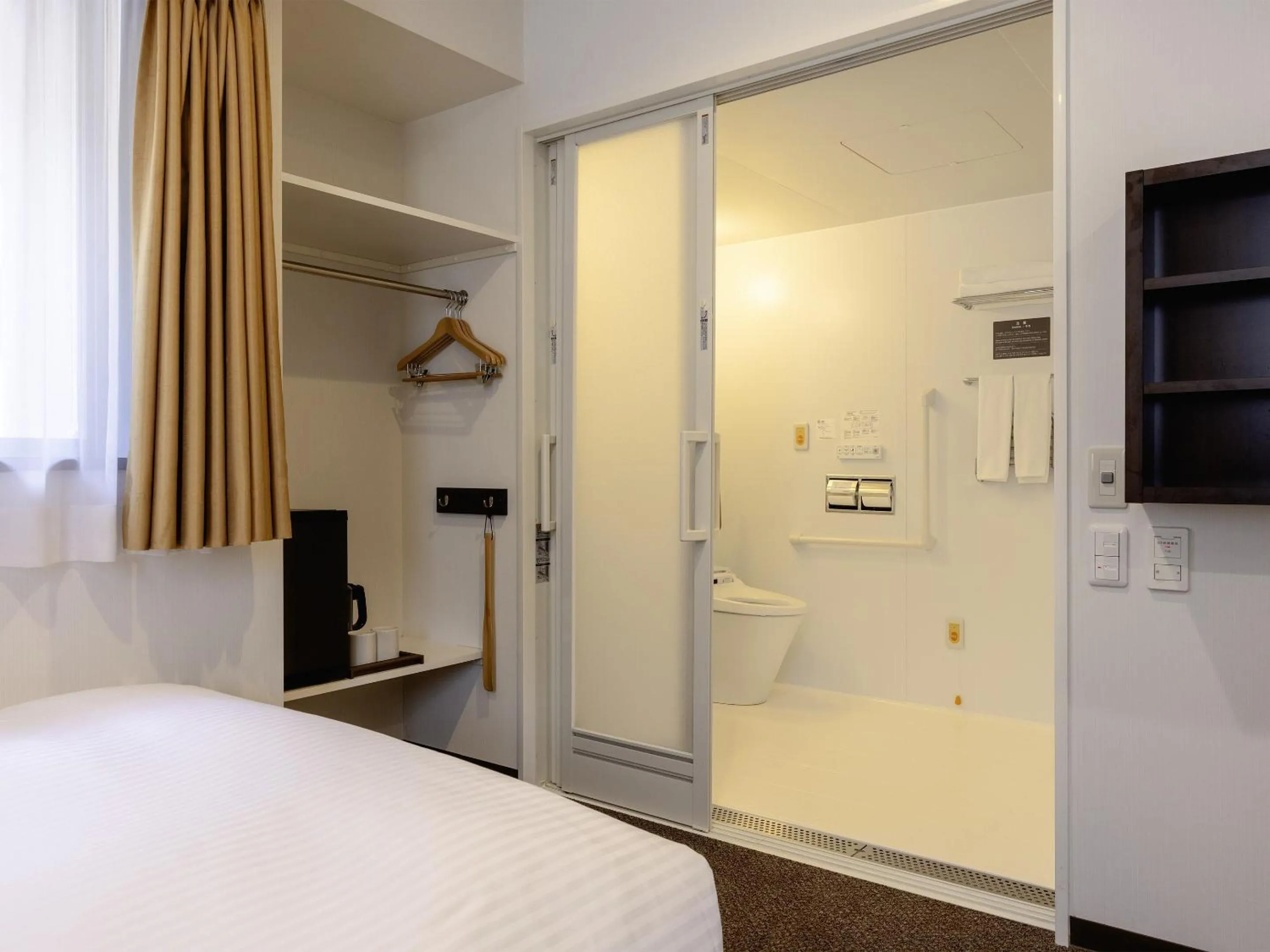 Bed in Hotel Wing International Tokyo Akabane