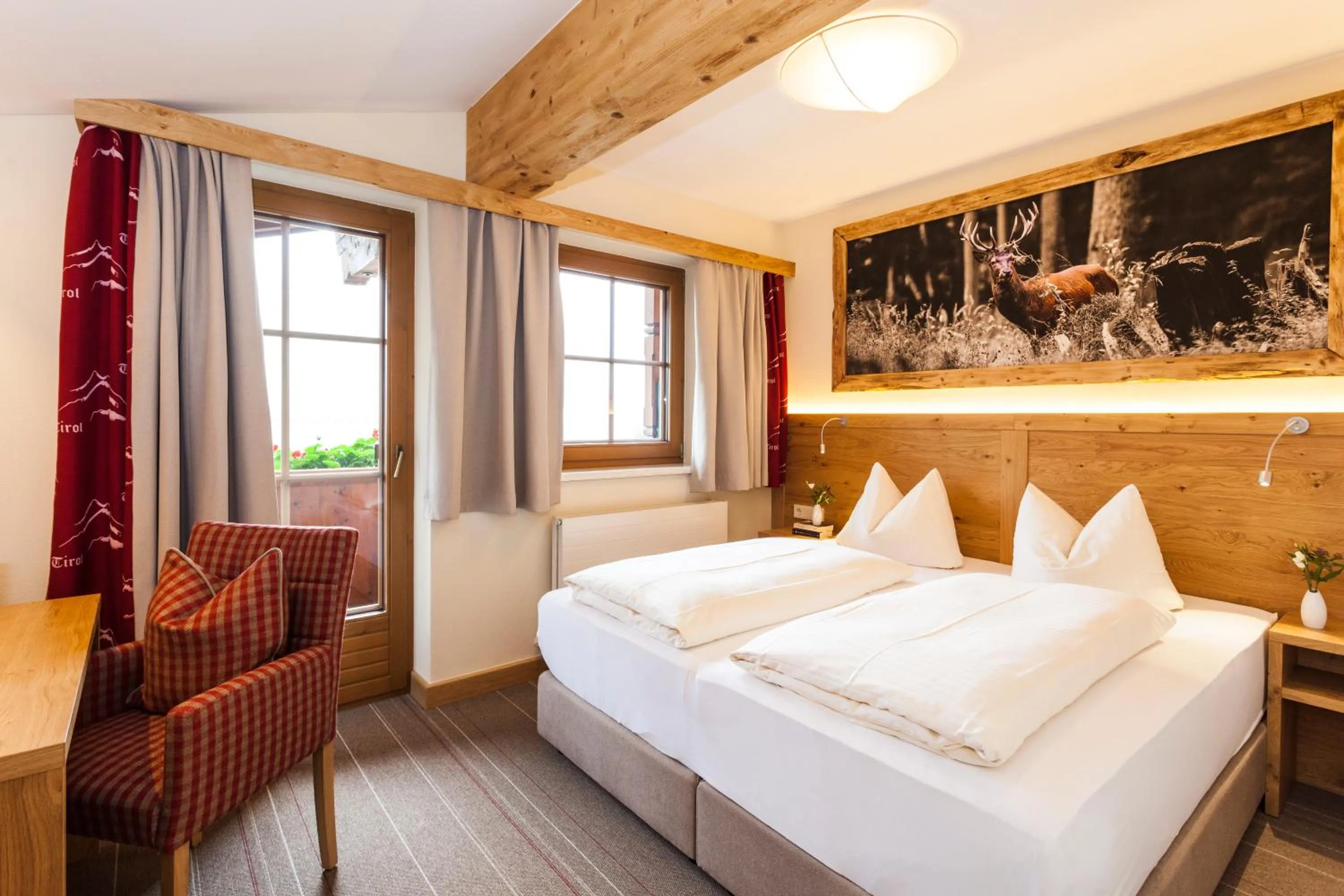 Photo of the whole room, Bed in Hotel Kaiser in Tirol