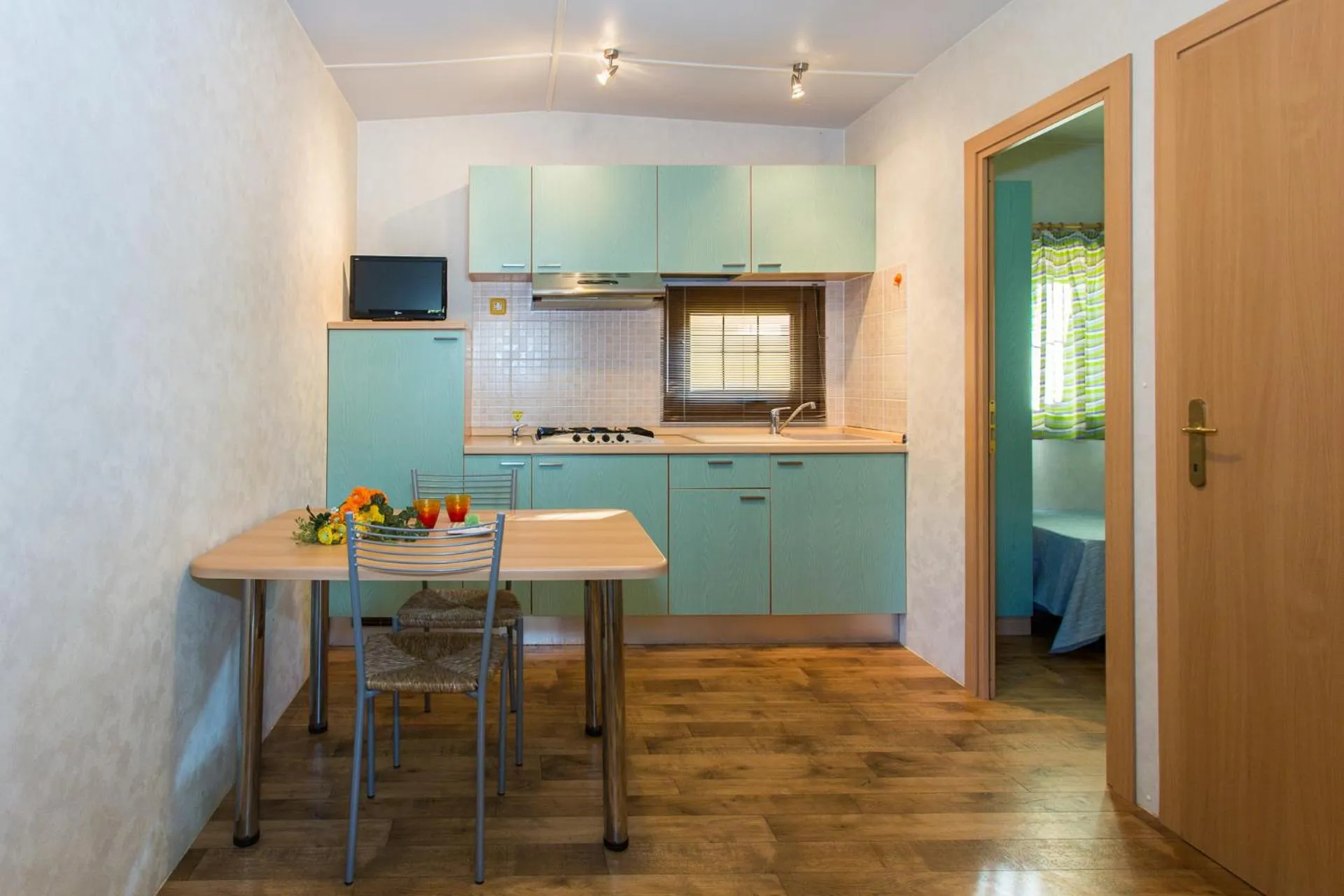 Kitchen or kitchenette in Club del Sole Rivaverde Easy Camping Village