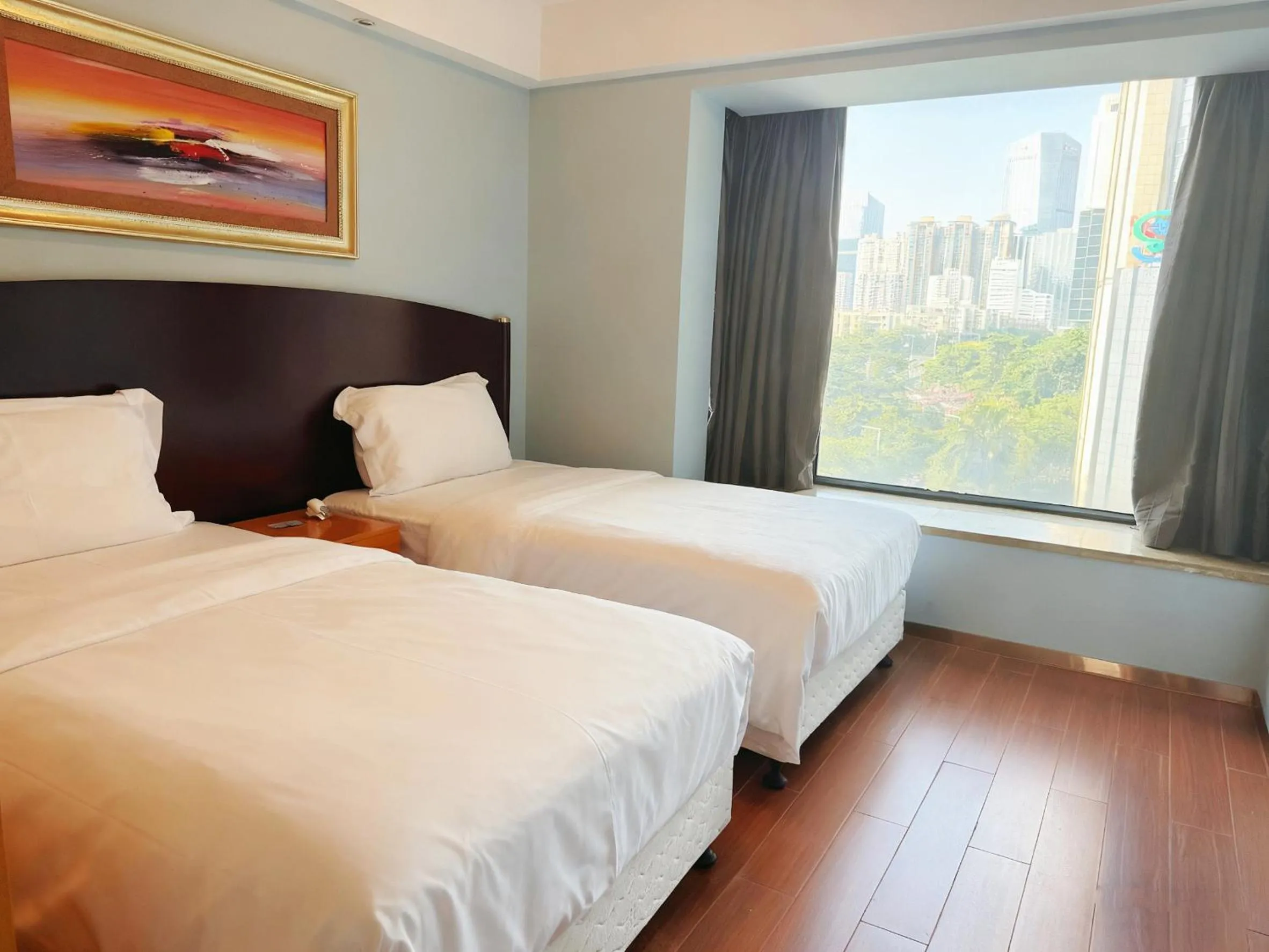 Bed in 广州丹顿行政公寓-Dan Executive Apartment Guangzhou Zhujiang New Town