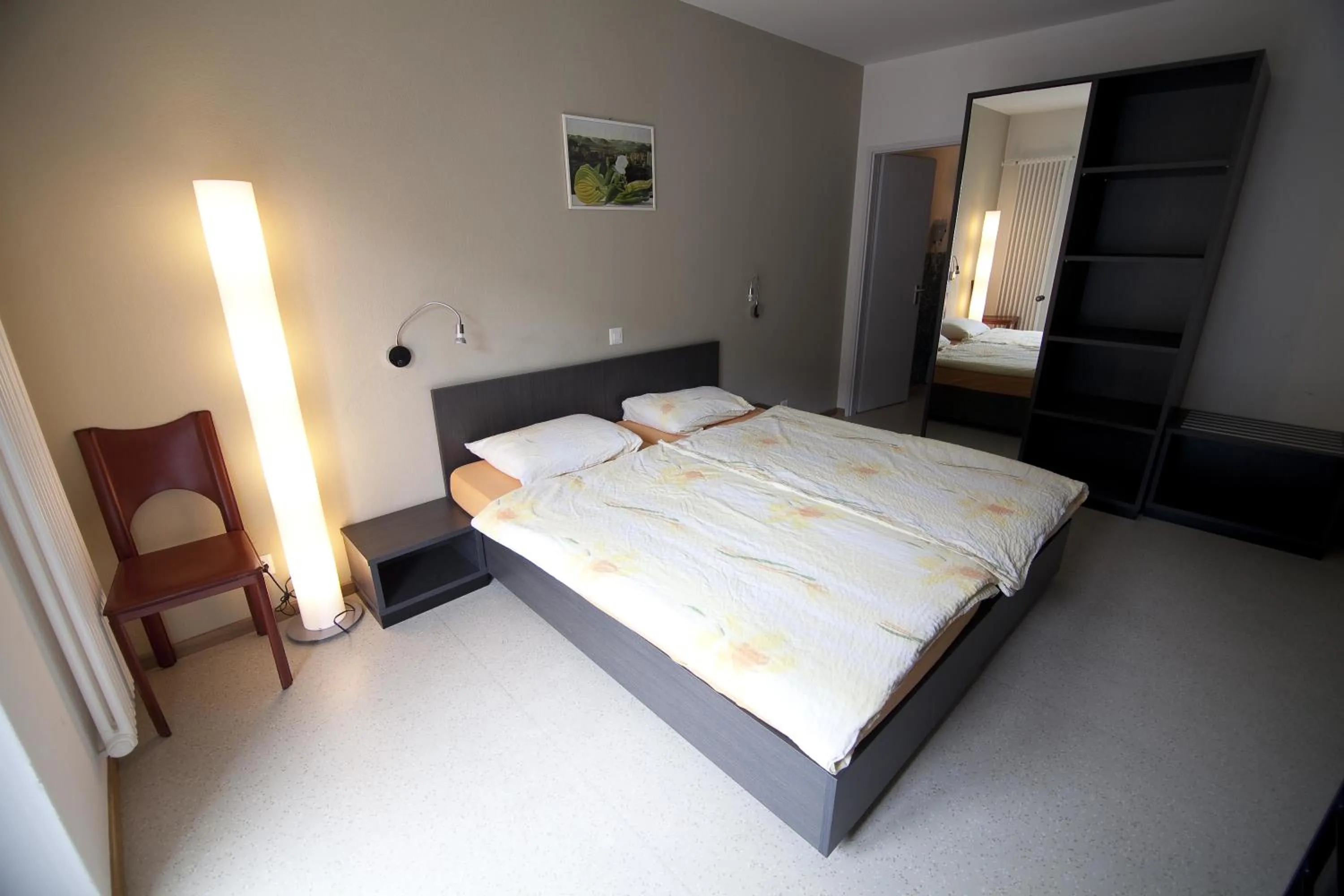 Photo of the whole room, Bed in Albergo Elvezia
