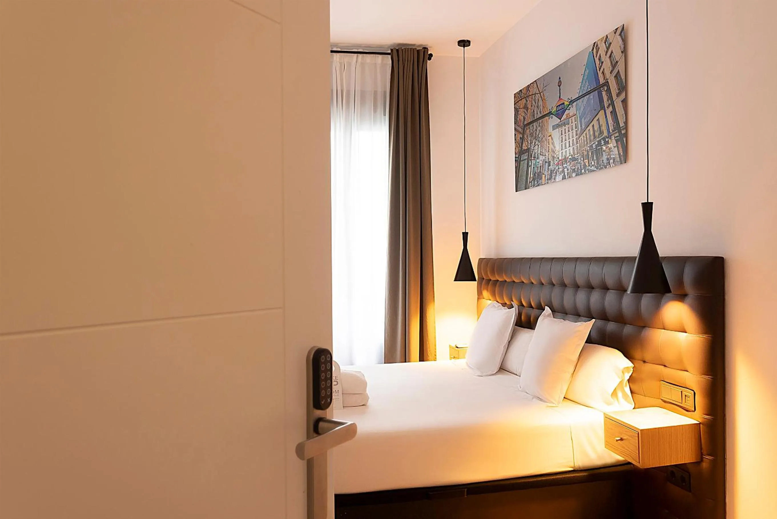 Bed in Woohoo Rooms Chueca