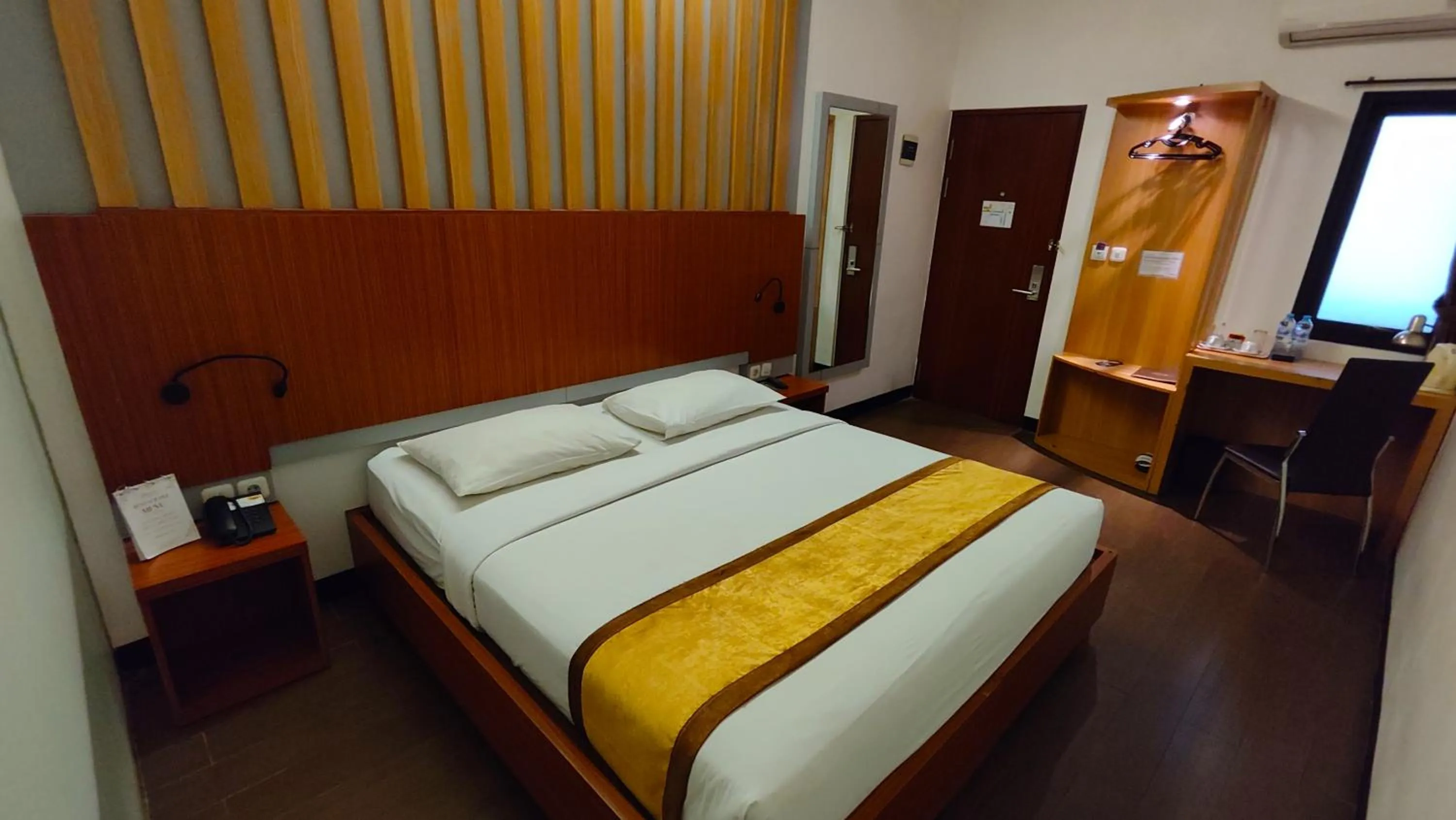Bed in Odaita Hotel Pamekasan Madura
