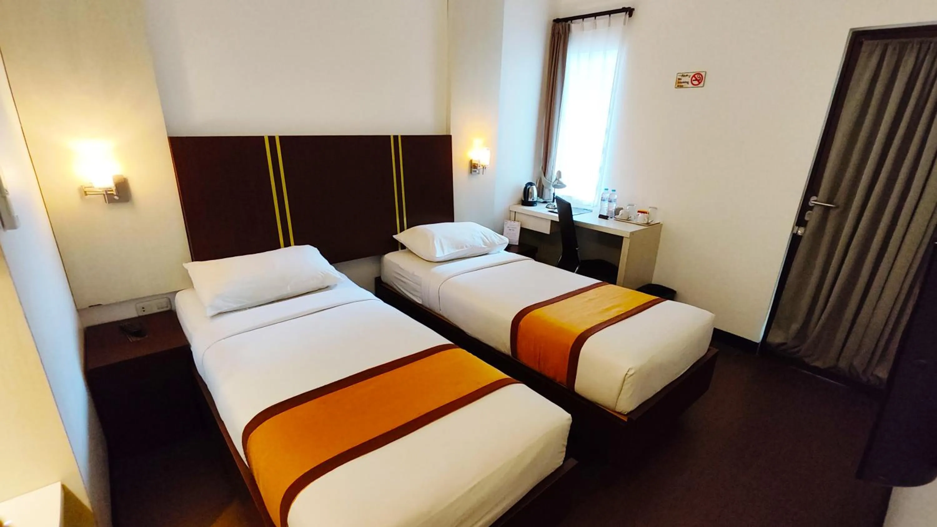 Bed in Odaita Hotel Pamekasan Madura