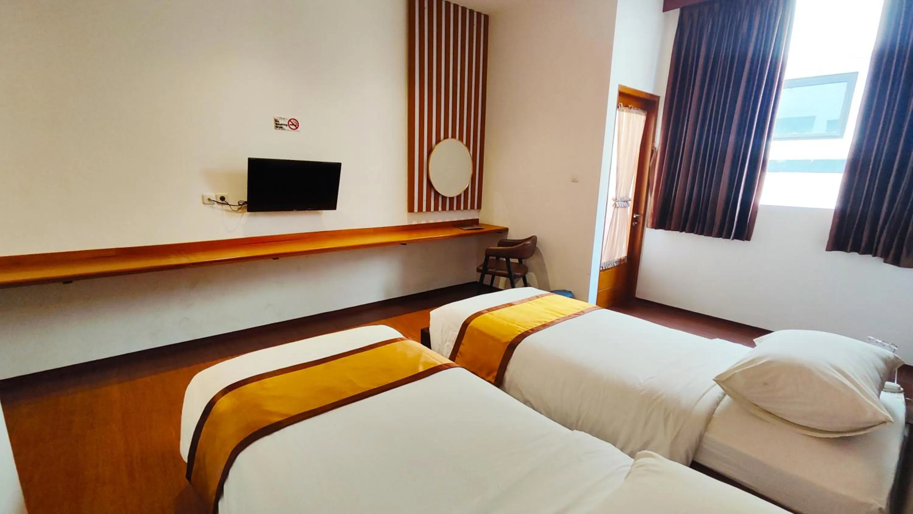 Bed in Odaita Hotel Pamekasan Madura