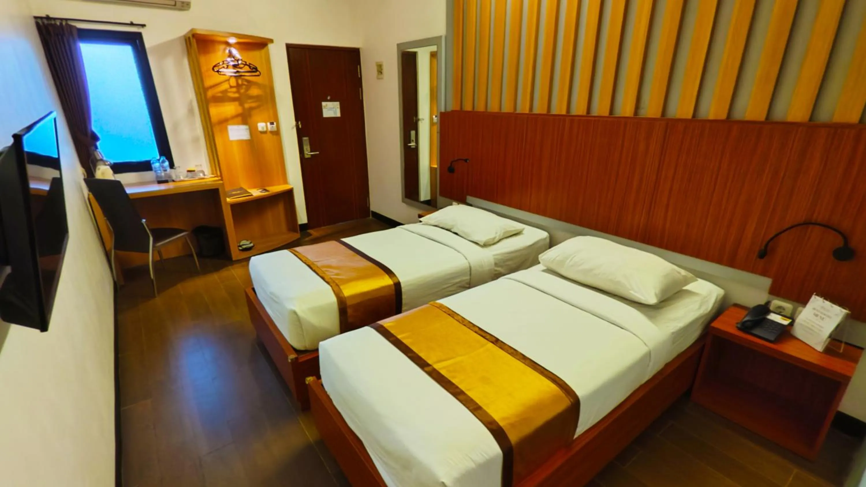 Bed in Odaita Hotel Pamekasan Madura