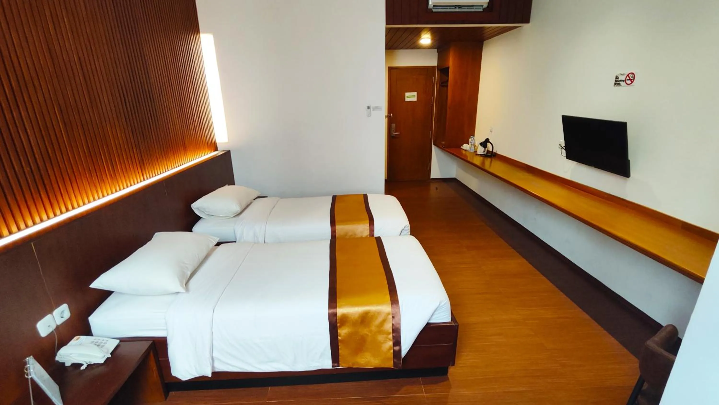 Bed in Odaita Hotel Pamekasan Madura
