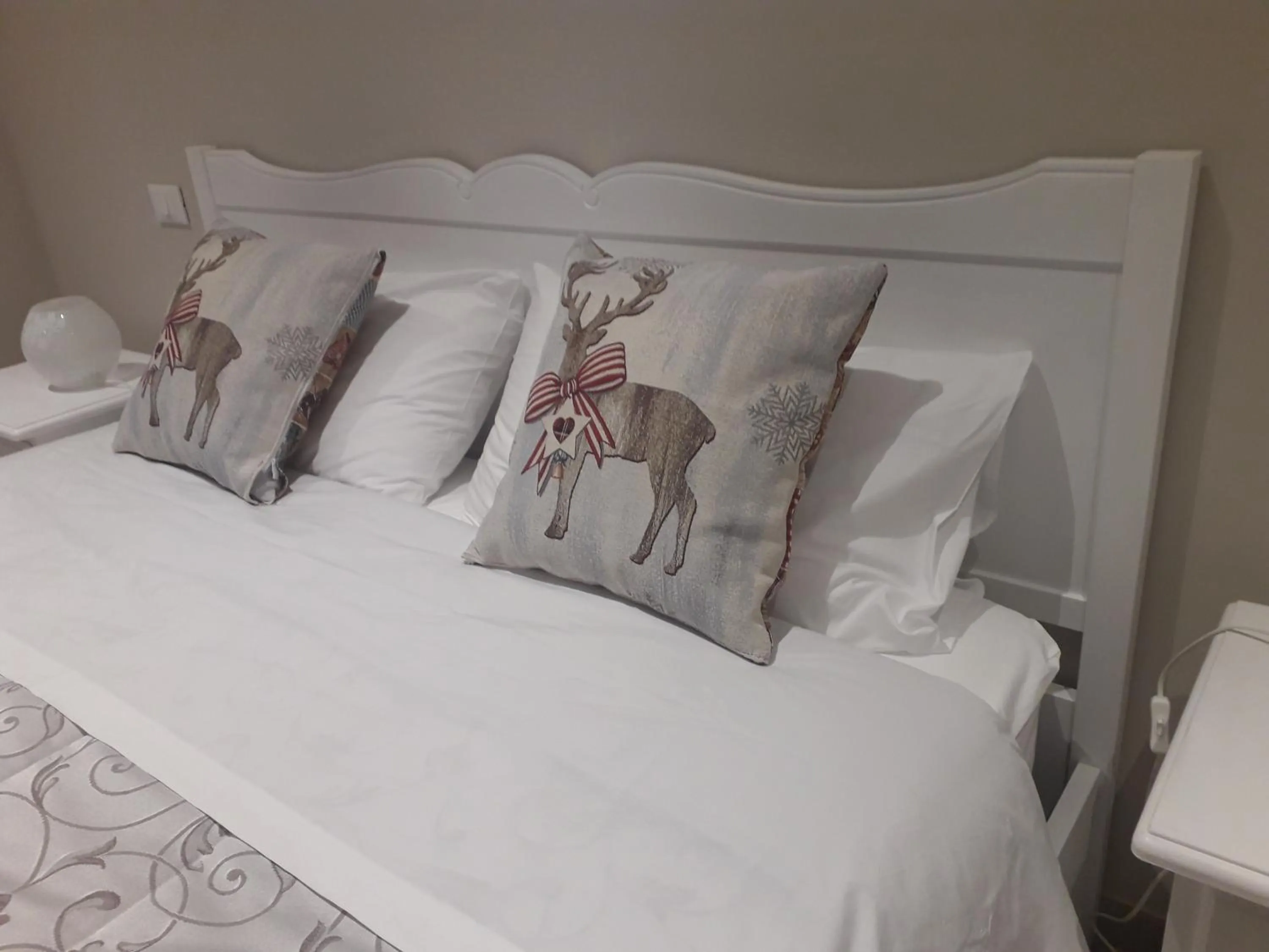 Decorative detail, Bed in Reggiolacittàinvisibile B&B