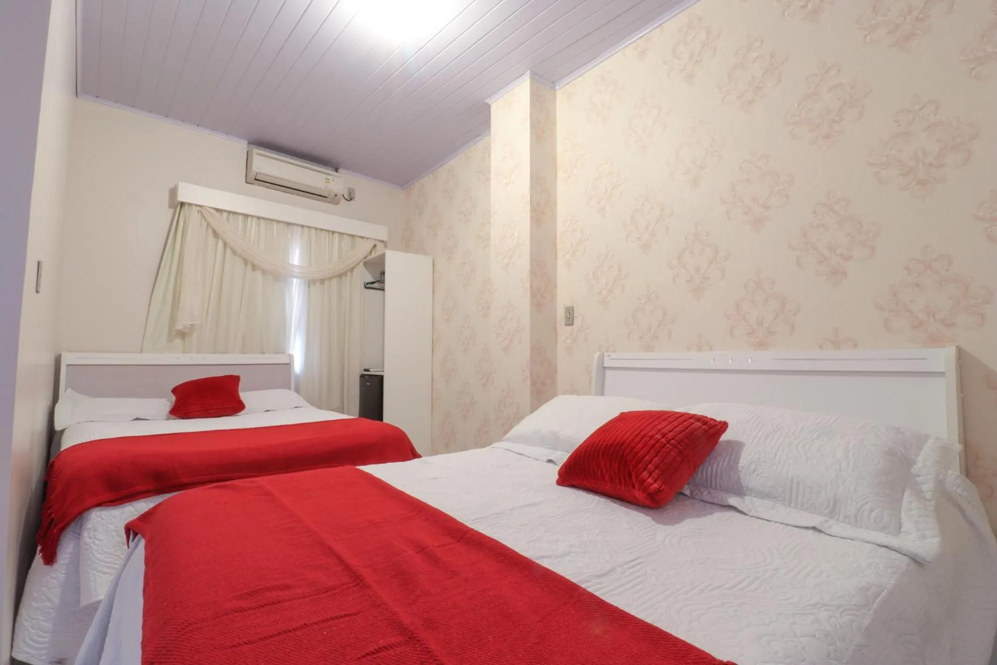 Property building, Bed in Pousada Tia Eni