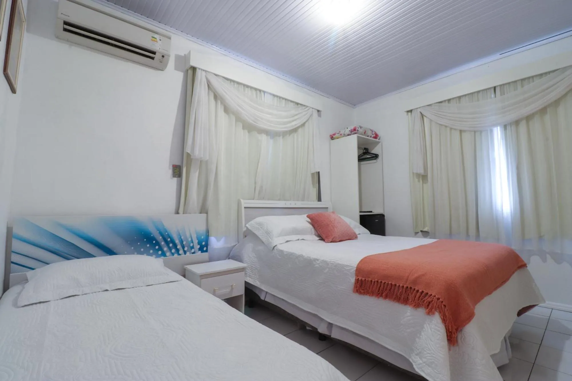 Property building, Bed in Pousada Tia Eni