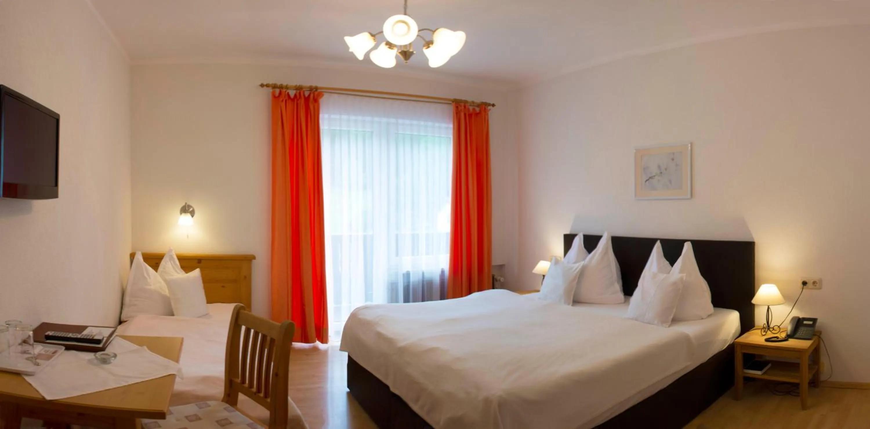 Photo of the whole room, Bed in Alpenhotel Ensmann