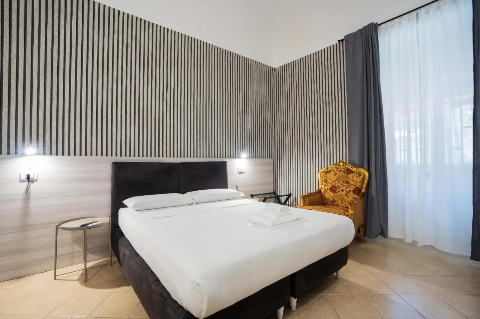 Bed in Hotel Trieste