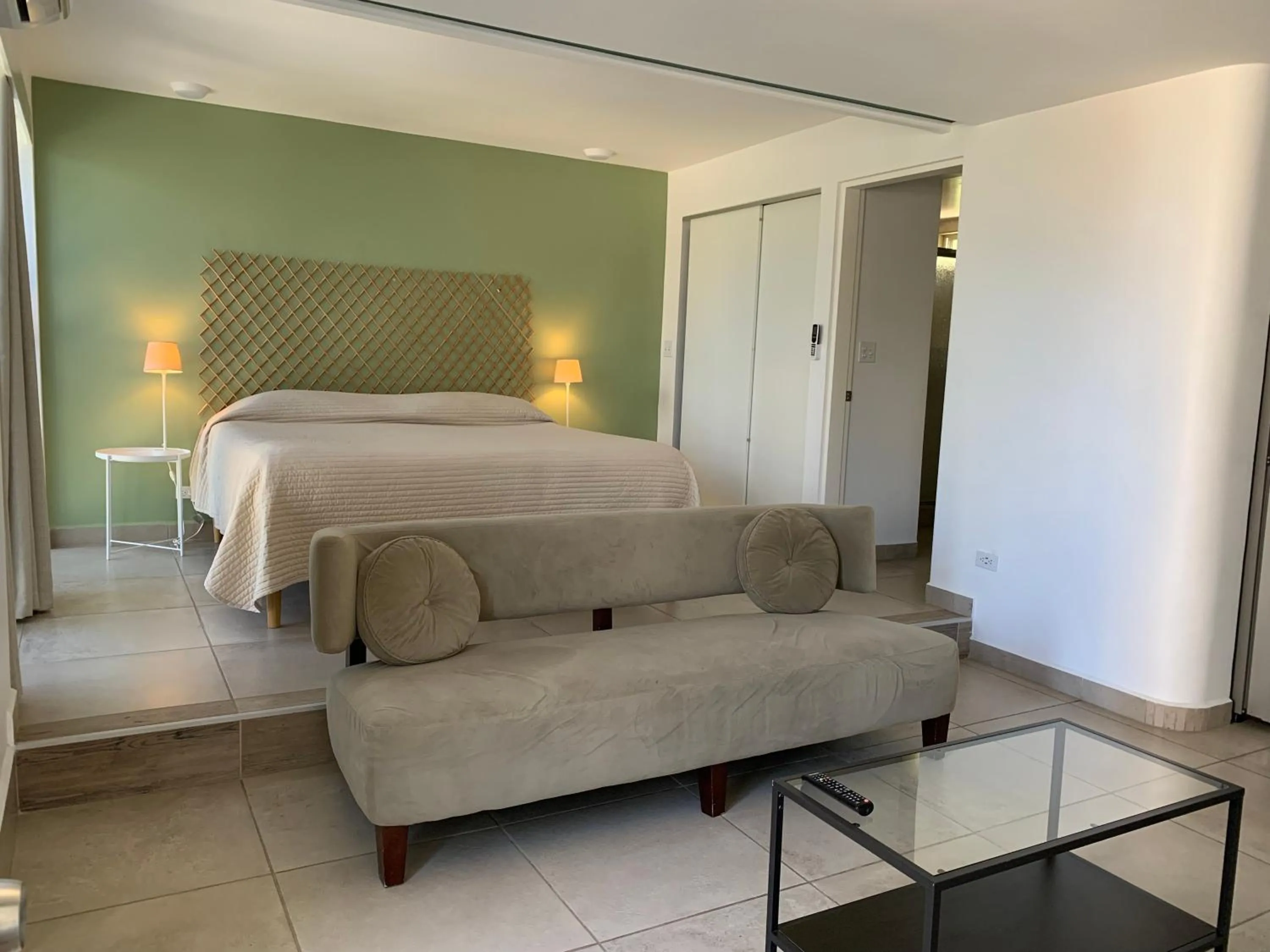 Photo of the whole room, Bed in Dali Suites -Accommodations in Playas de Tijuana