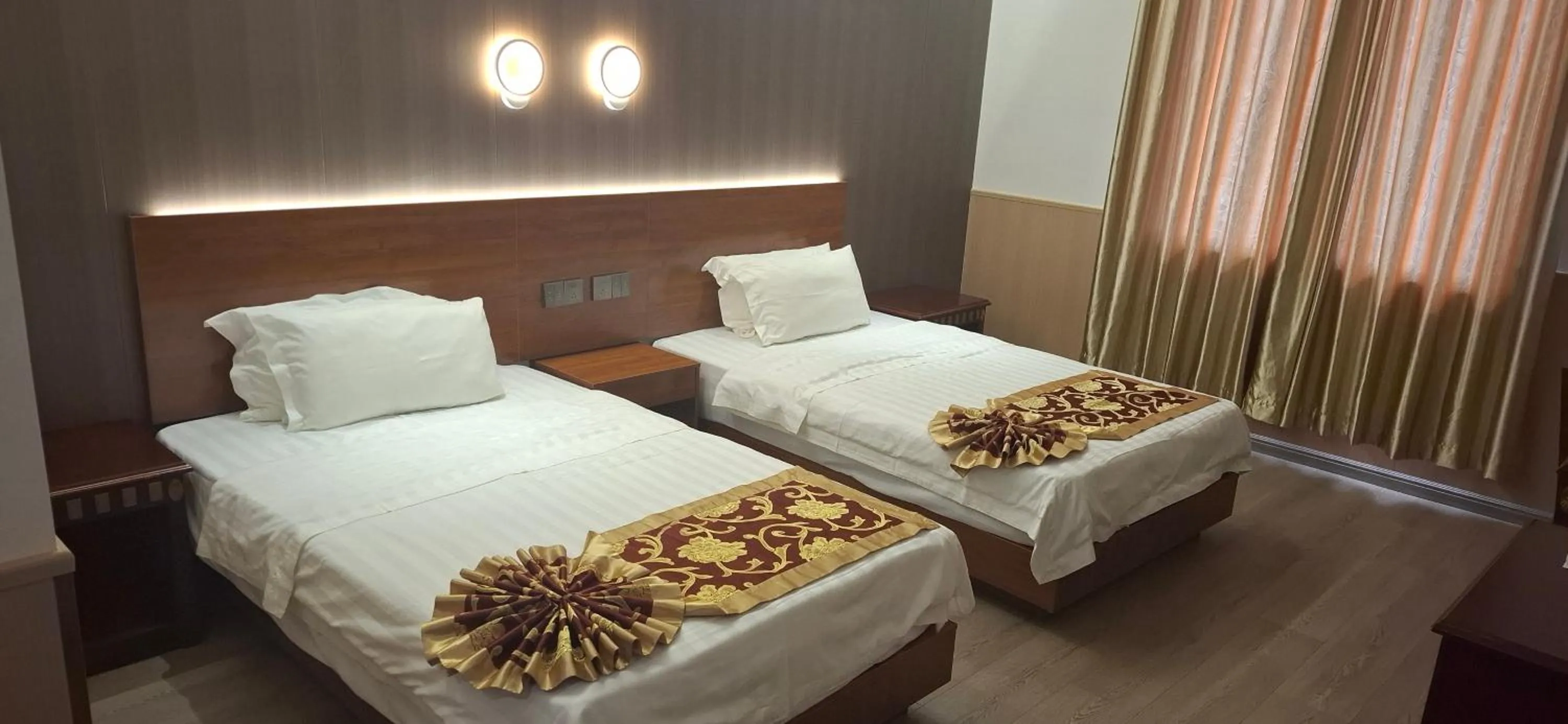 Bed in Beach Garden Hotel