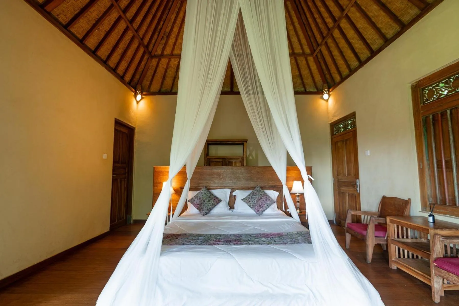 Bed in Saridevi Ecolodge