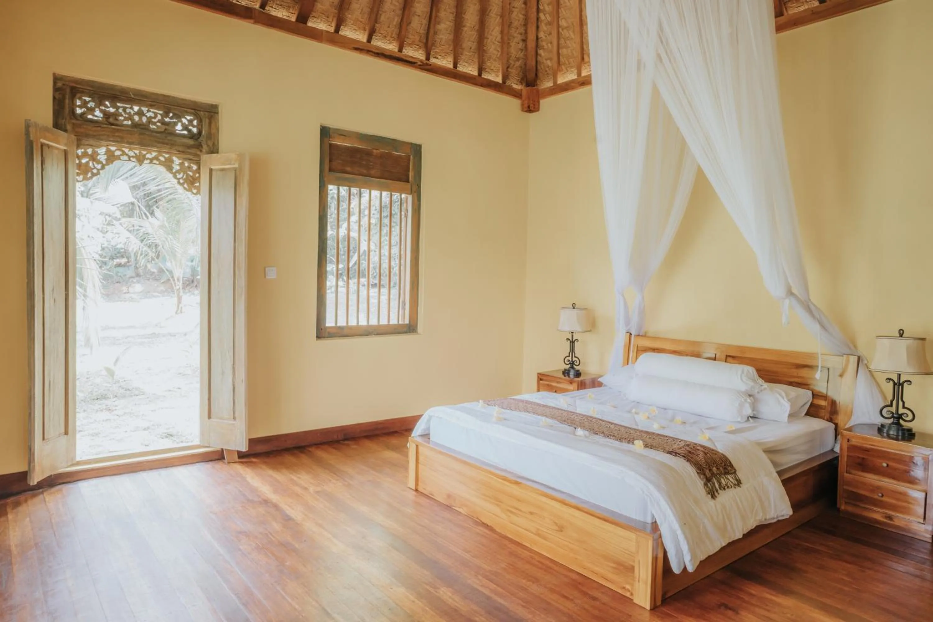 Bed in Saridevi Ecolodge