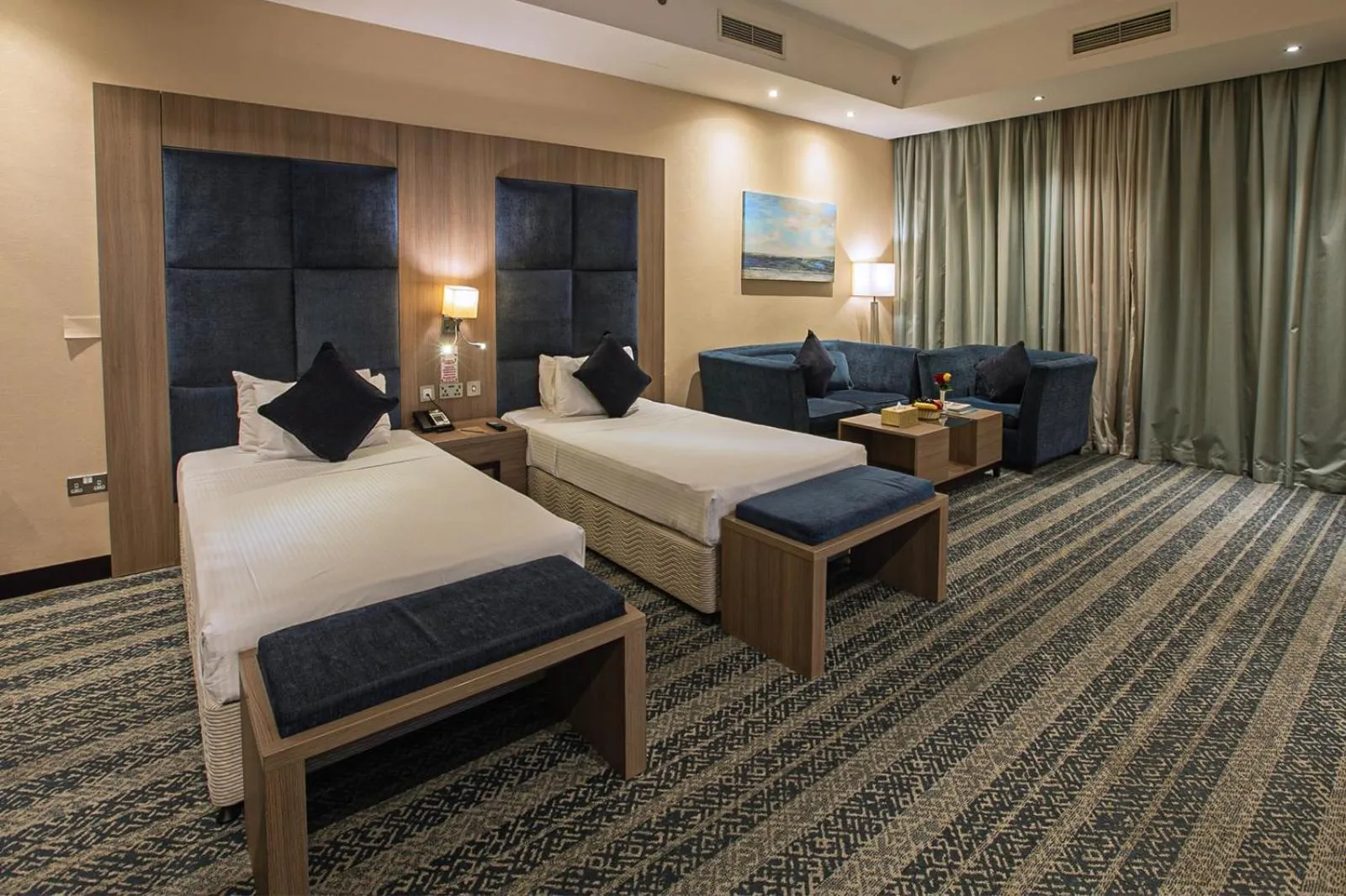 Bed in The CASTLE PREMIUM HOTEL