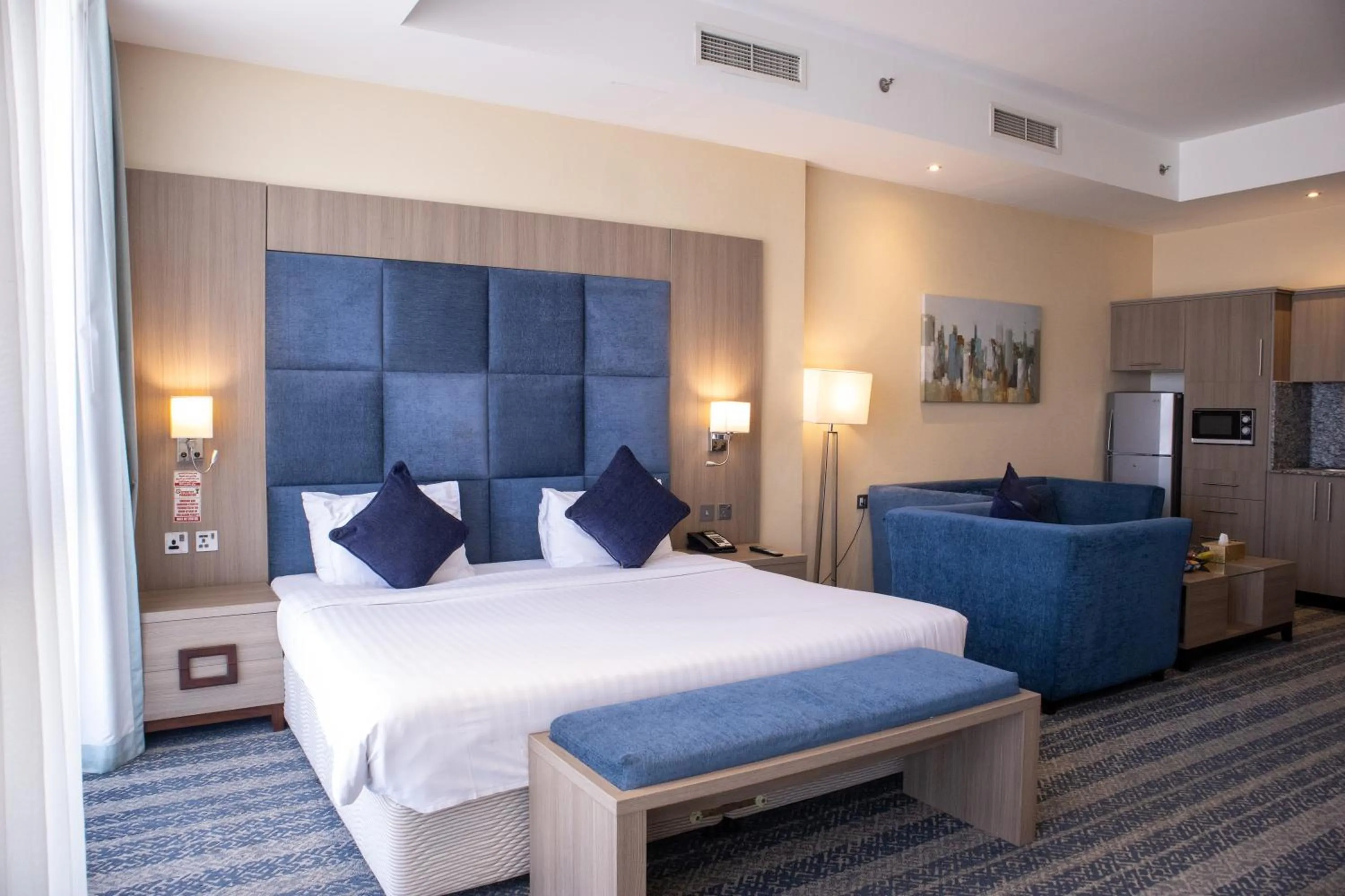 Seating area, Bed in The CASTLE PREMIUM HOTEL