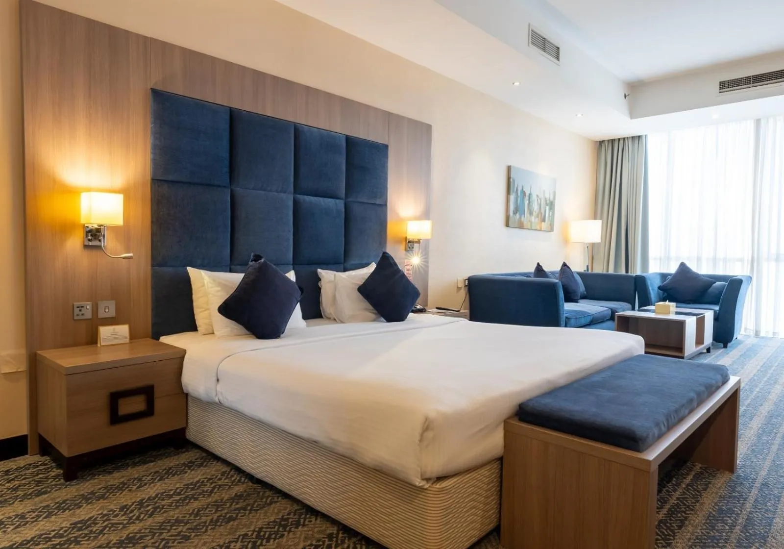 Seating area, Bed in The CASTLE PREMIUM HOTEL