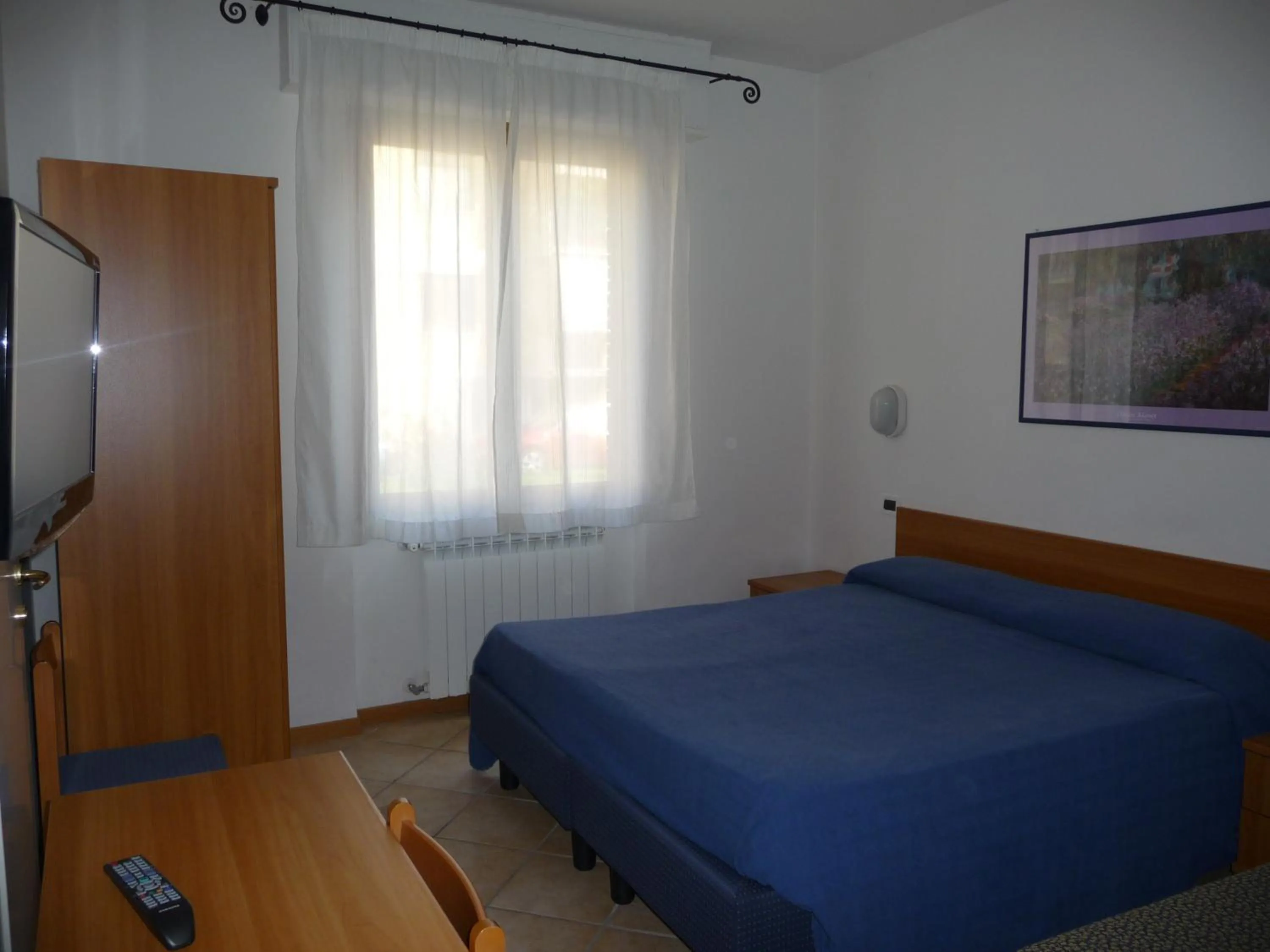 Bedroom, Bed in Hotel La Toscana