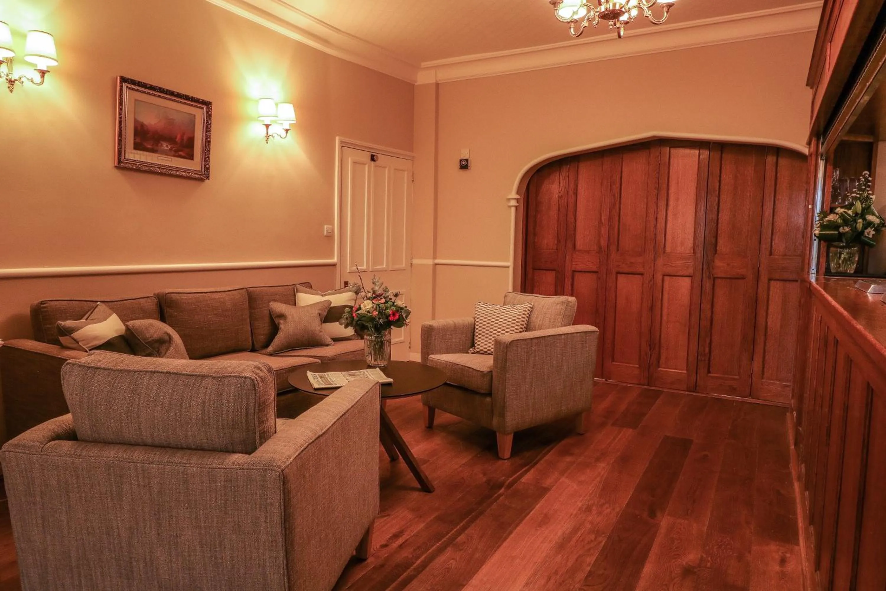 Communal lounge/ TV room in Briery Wood Hotel
