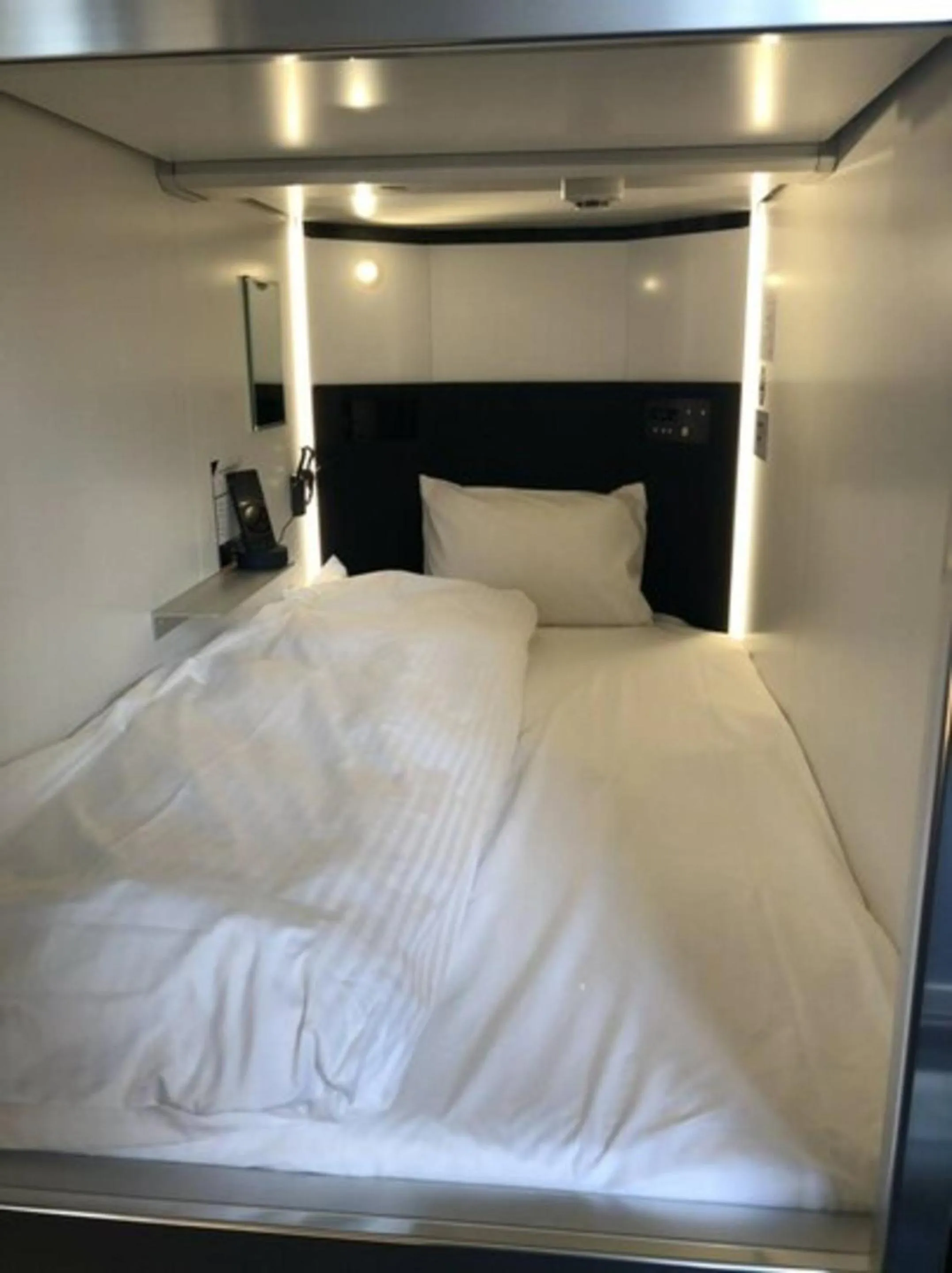 Bed in HEARTS Capsule Hotel & Spa HAKATA