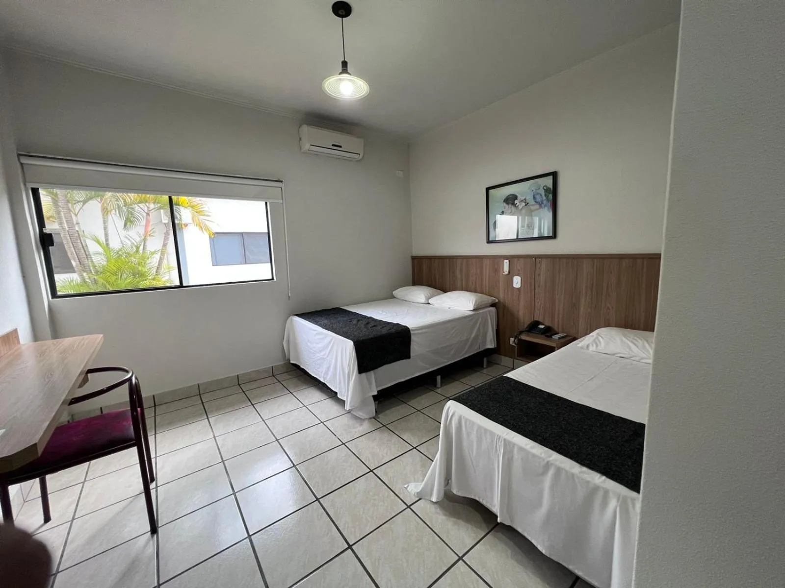 Bed in Rio Claro Plaza Hotel