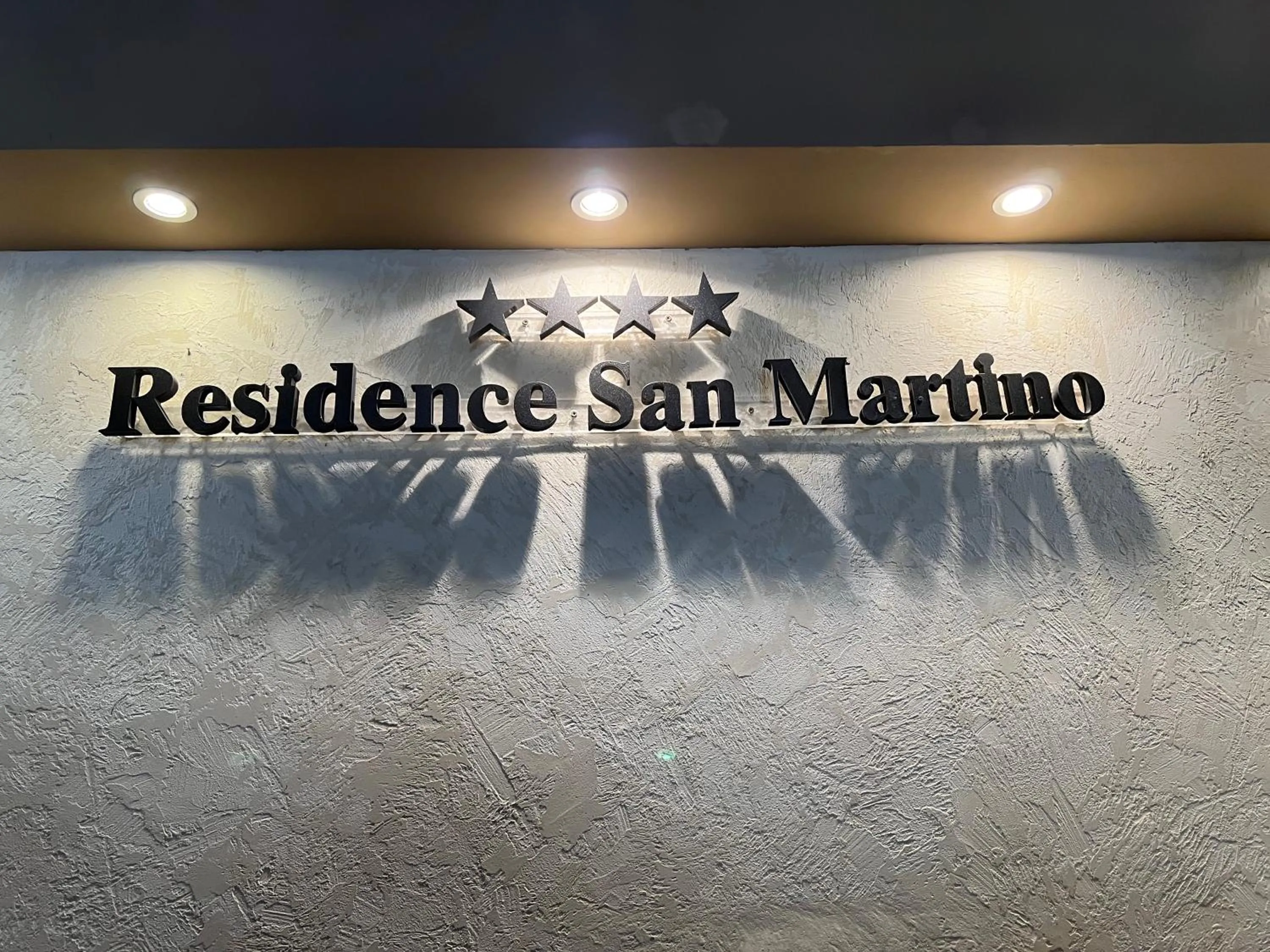 Property logo or sign in Residence San Martino