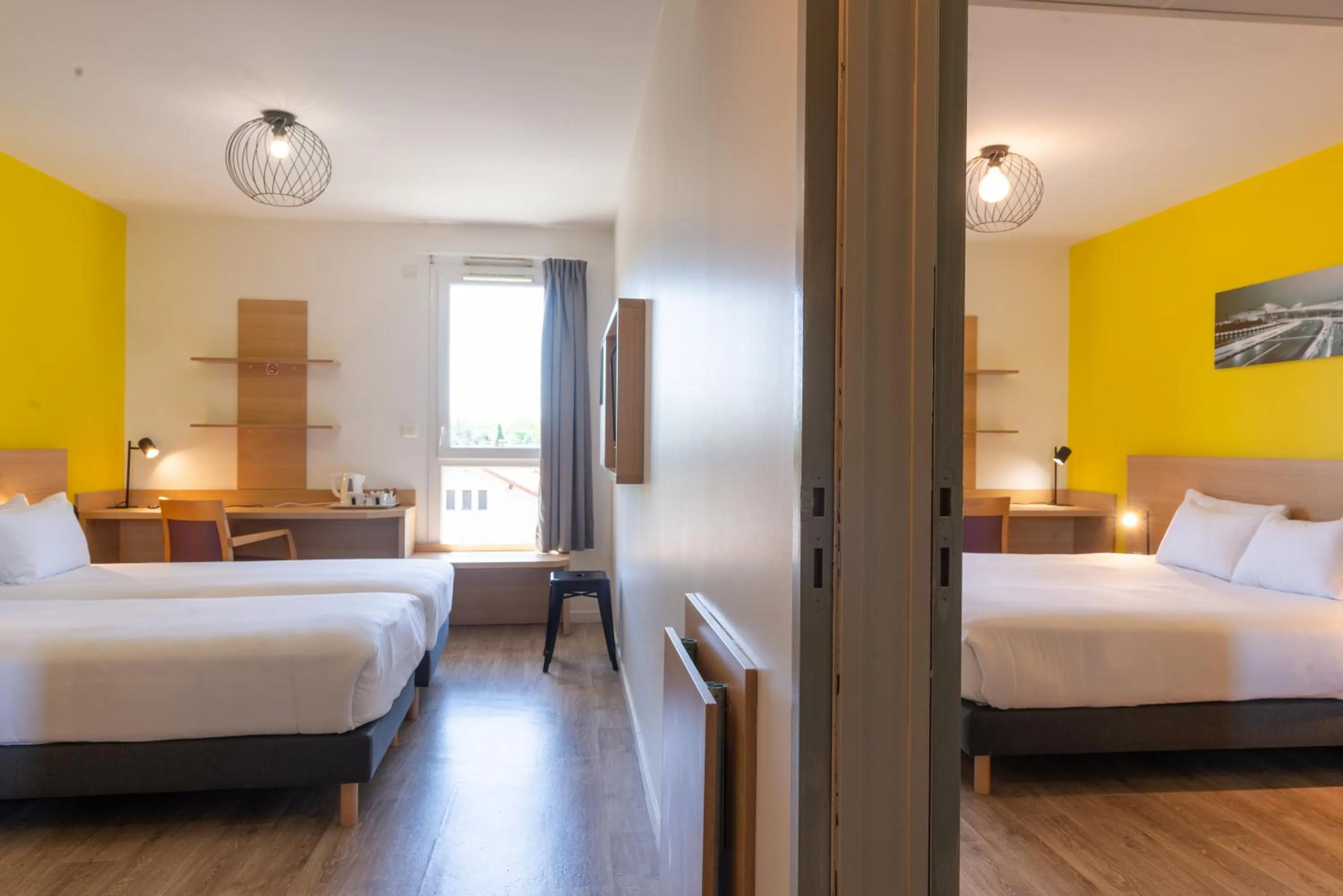 Photo of the whole room, Bed in EastLodge Lyon Est Eurexpo