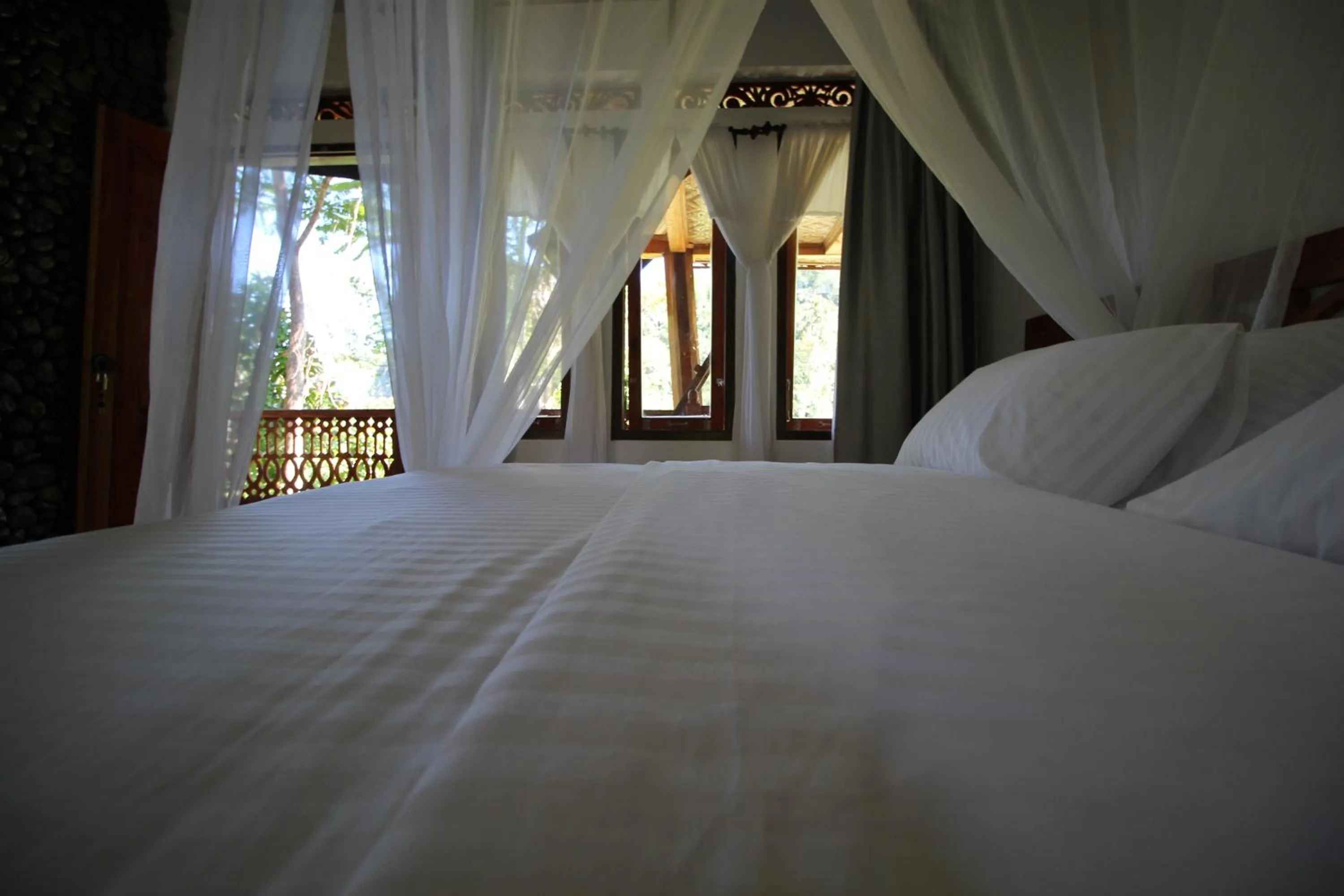 Bed in Padi Ecolodge