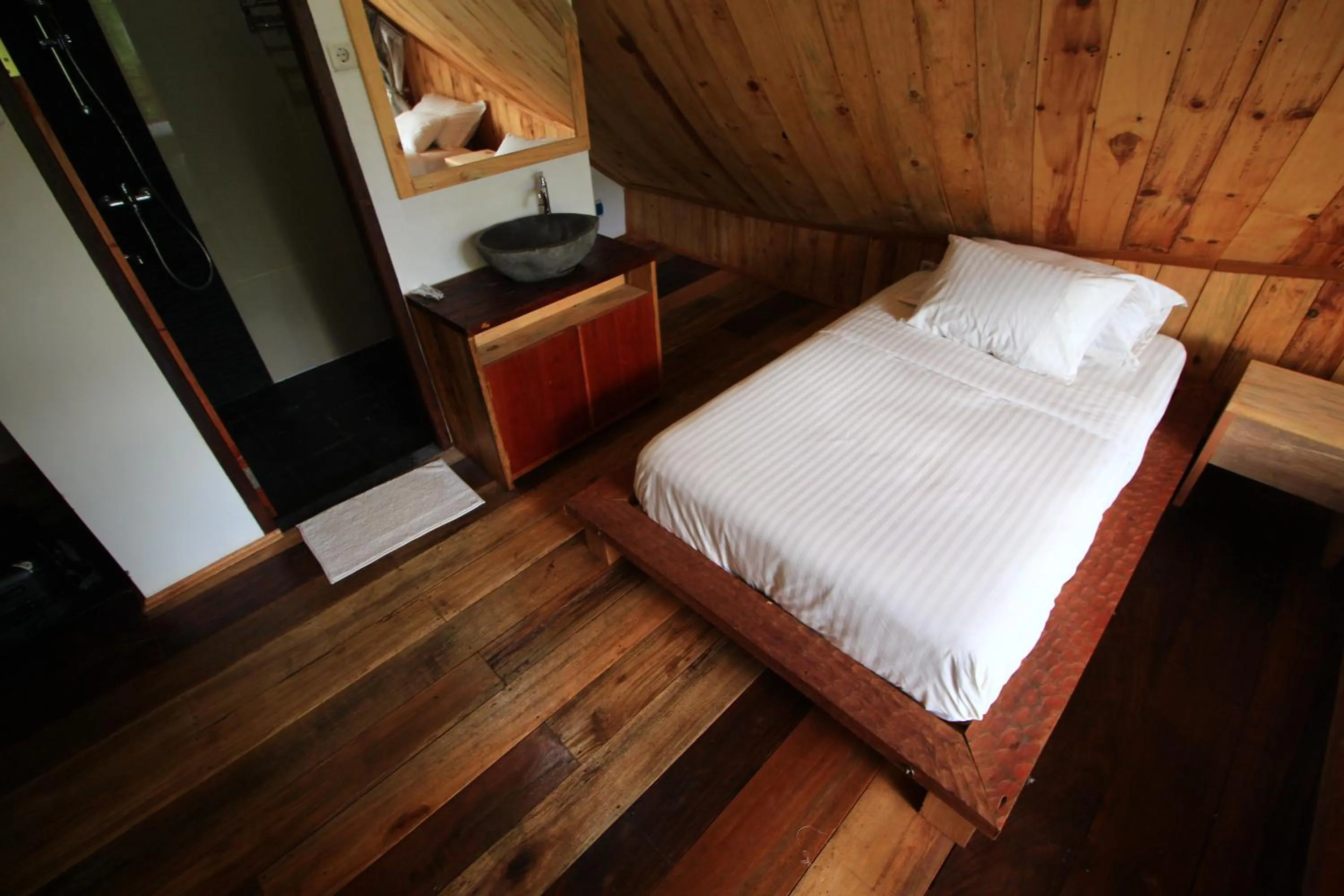 Bed in Padi Ecolodge