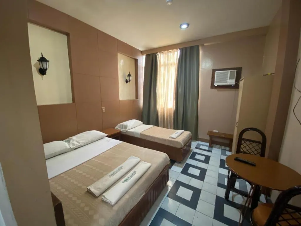 Bed in Bamboo Garden Bussiness Inn