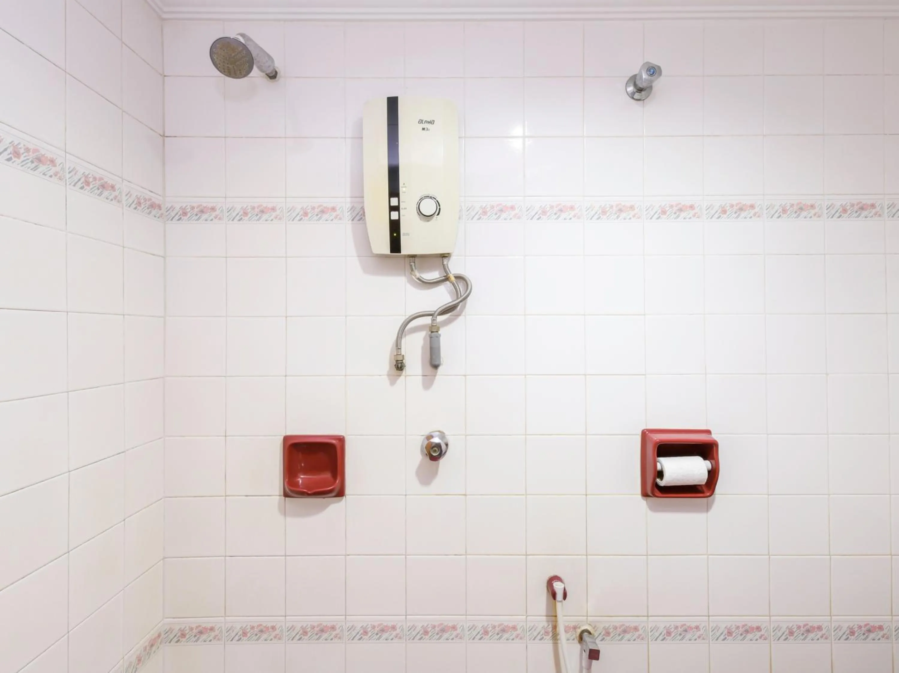 Bathroom in OYO 472 Comfort Hotel 1