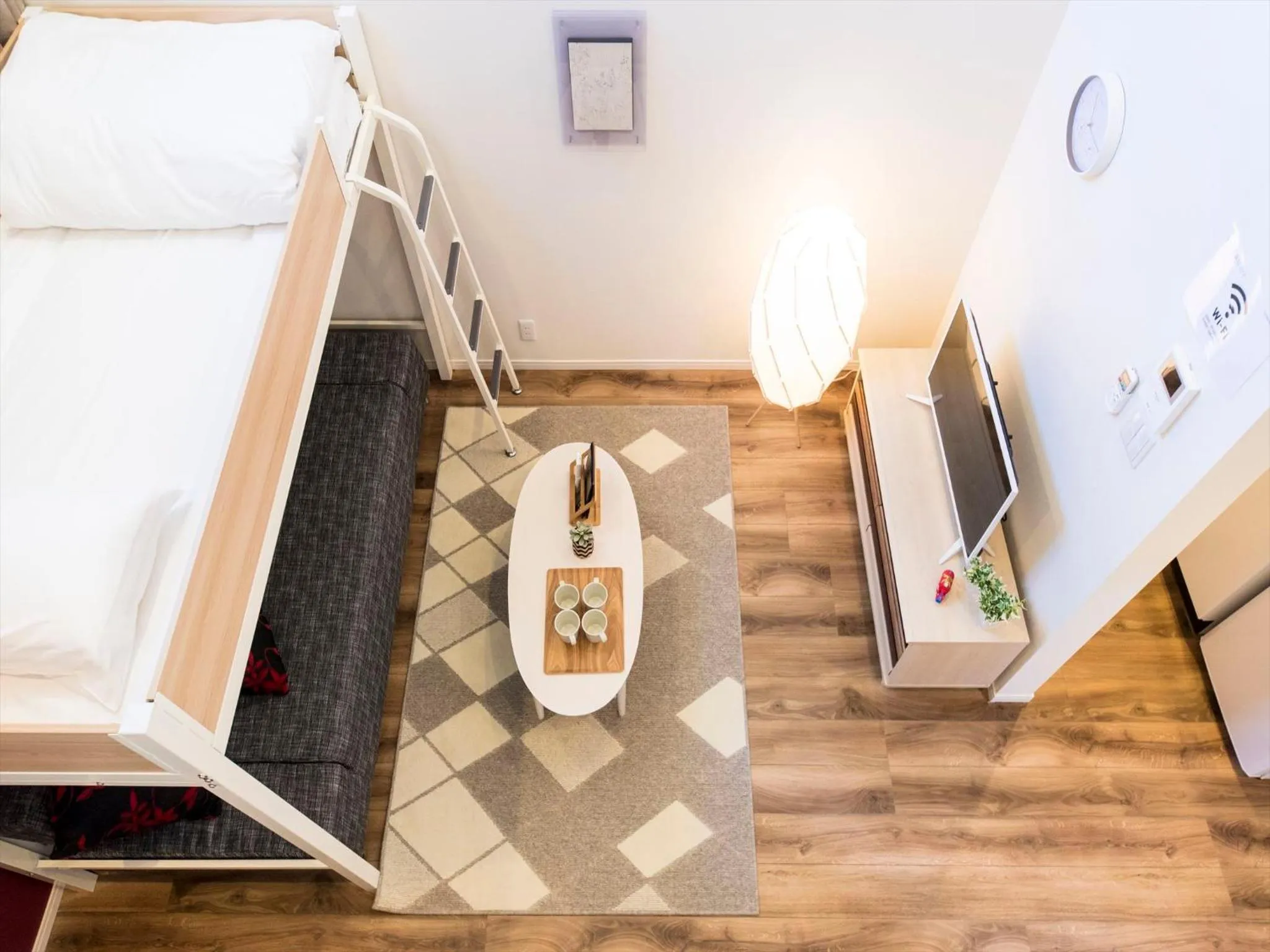 Living room, Bed in TRIP POD CHIYO A