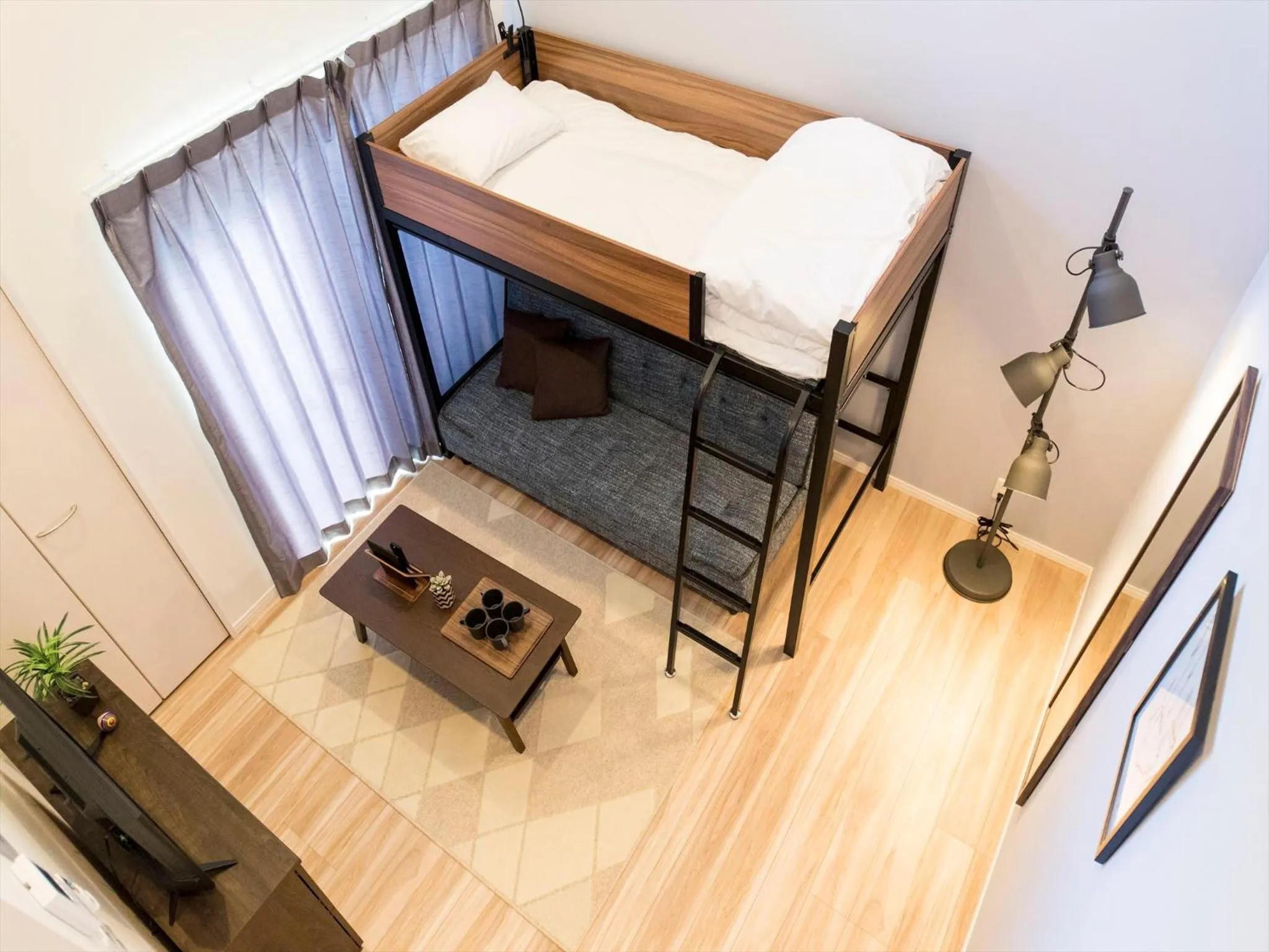 Living room, Bed in TRIP POD MINOSHIMA A