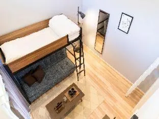 Bed in TRIP POD MINOSHIMA A