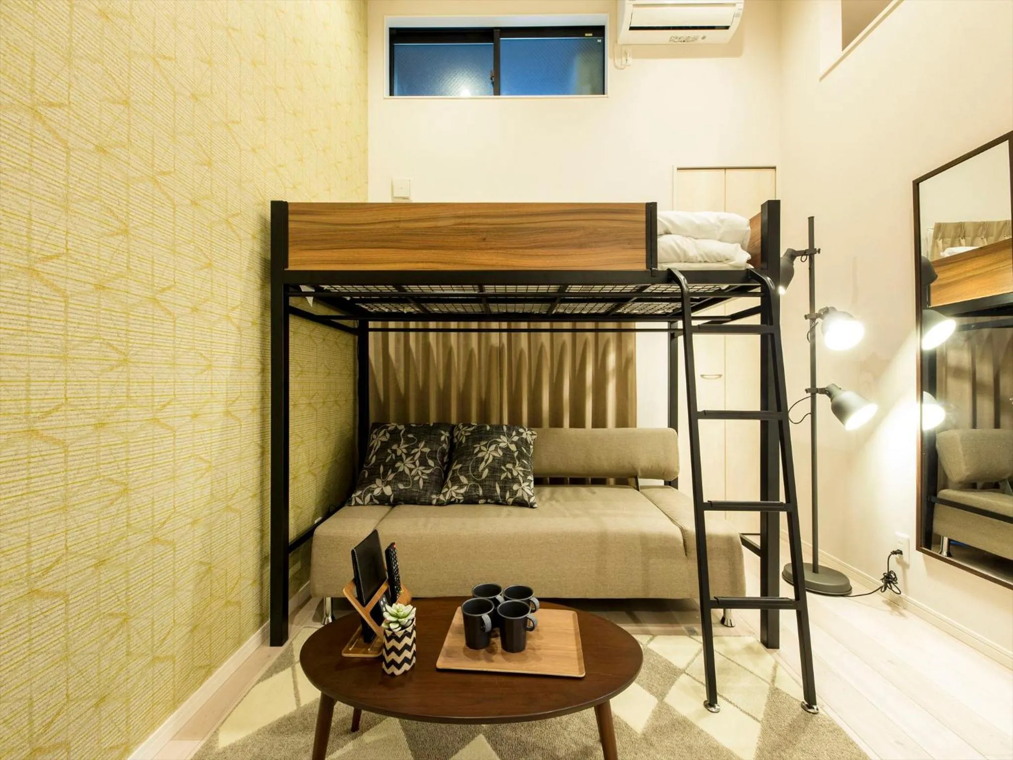 Living room, Bed in TRIP POD SUMIYOSHI B