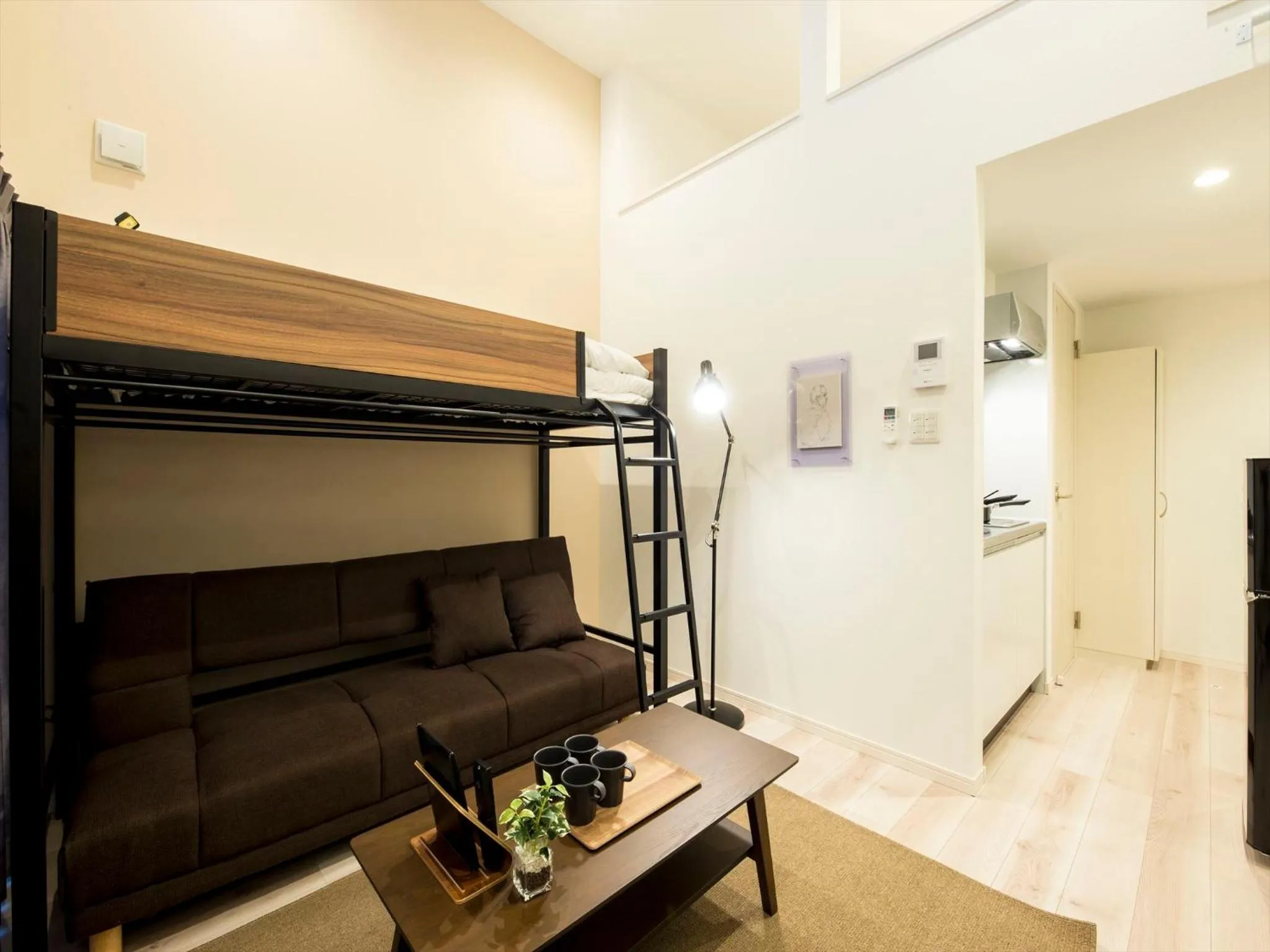 Living room, Bed in TRIP POD SUMIYOSHI B