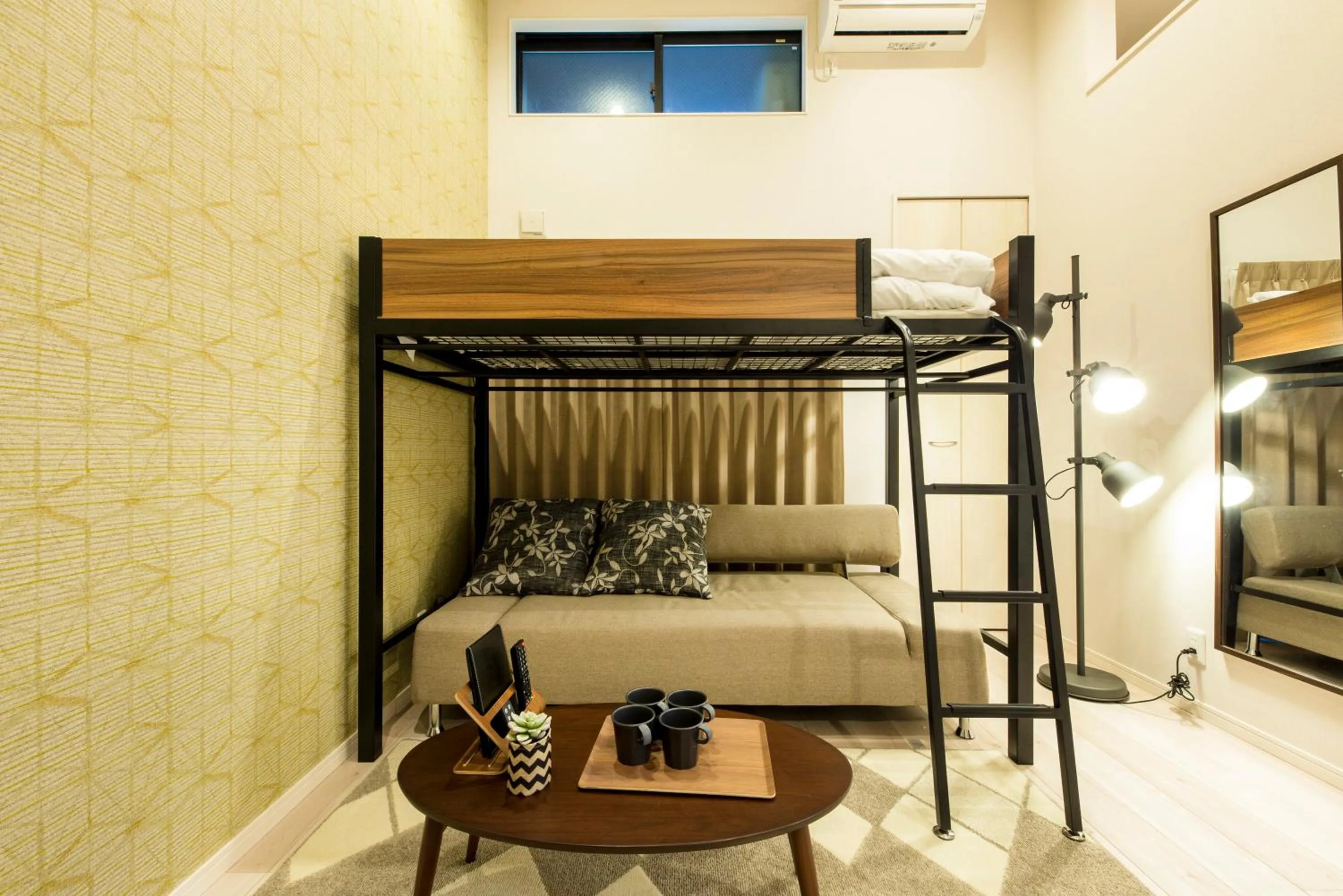 Living room, Bed in TRIP POD SUMIYOSHI B