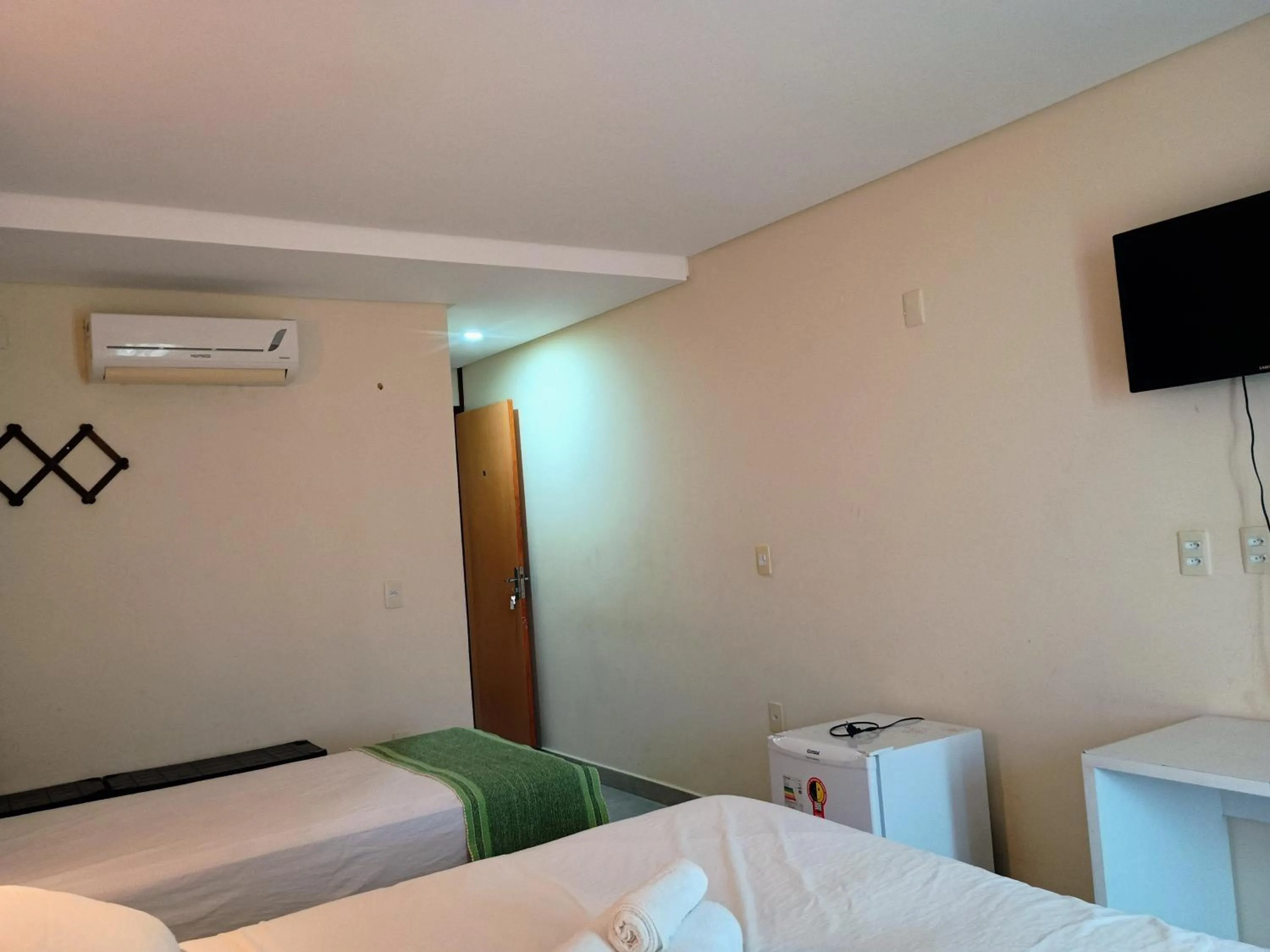 Photo of the whole room, Bed in Pousada Laguna